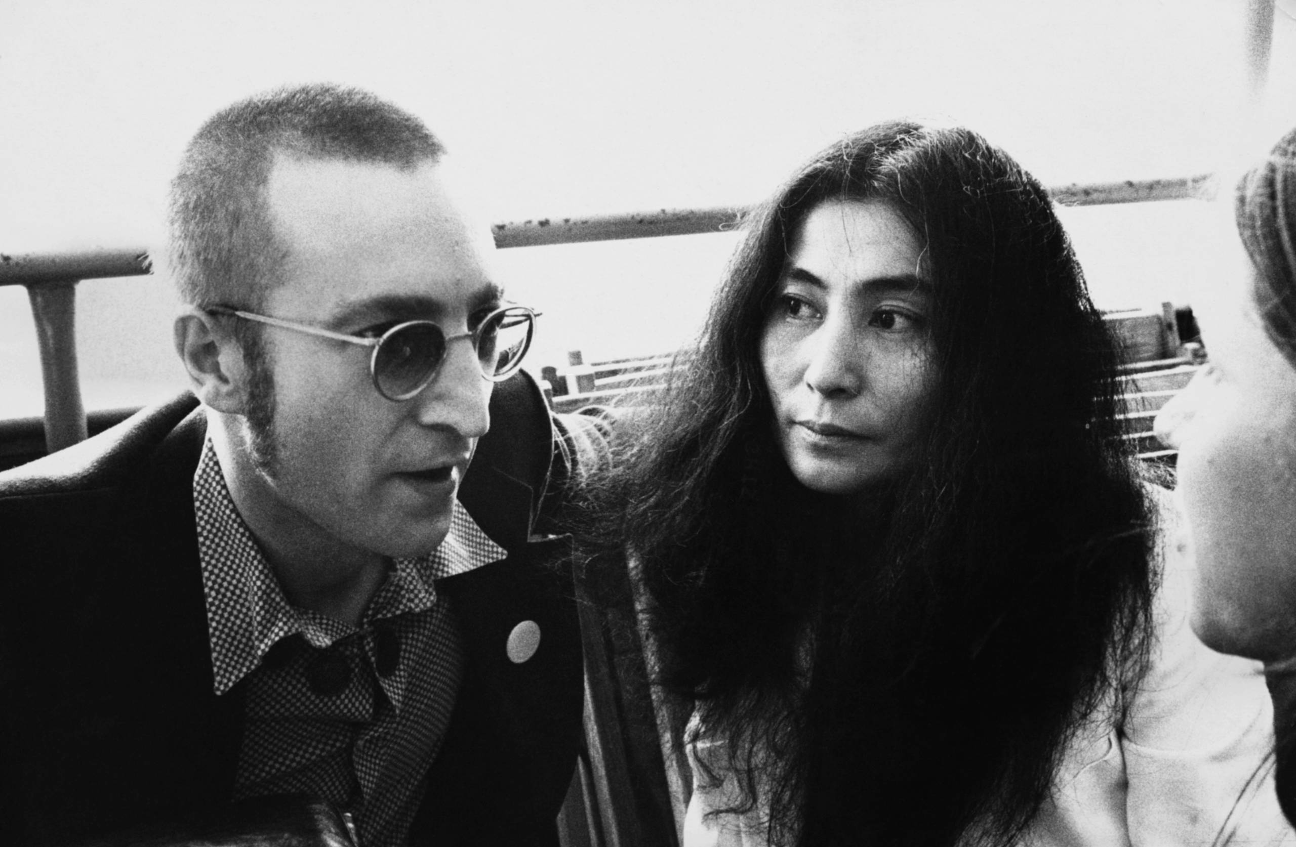 View of married musicians John Lennon (1940 - 1980) and Yoko Ono during a boat party hosted by Ms magazine, New York, New ...