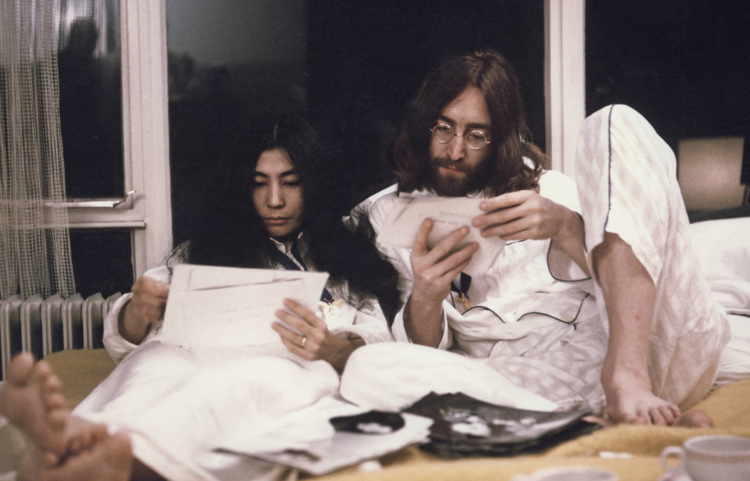 AMSTERDAM, NETHERLANDS - 1st MARCH: John Lennon (1940-1980) from the Beatles and his wife Yoko Ono (left) during their 'Be...