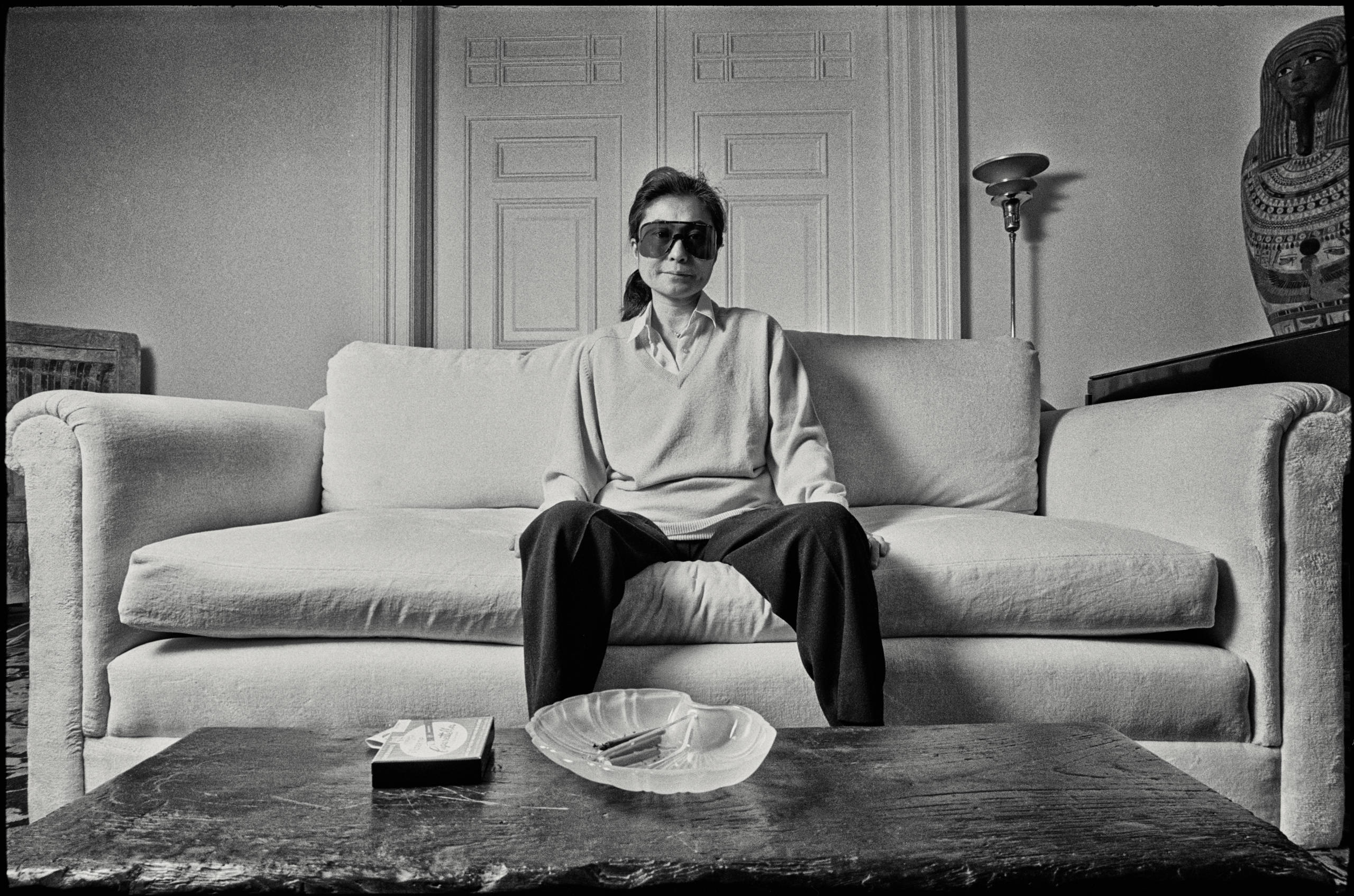 Japanese multimedia artist, singer and songwriter Yoko Ono in the lounge of the apartment she shared with John Lennon, one...