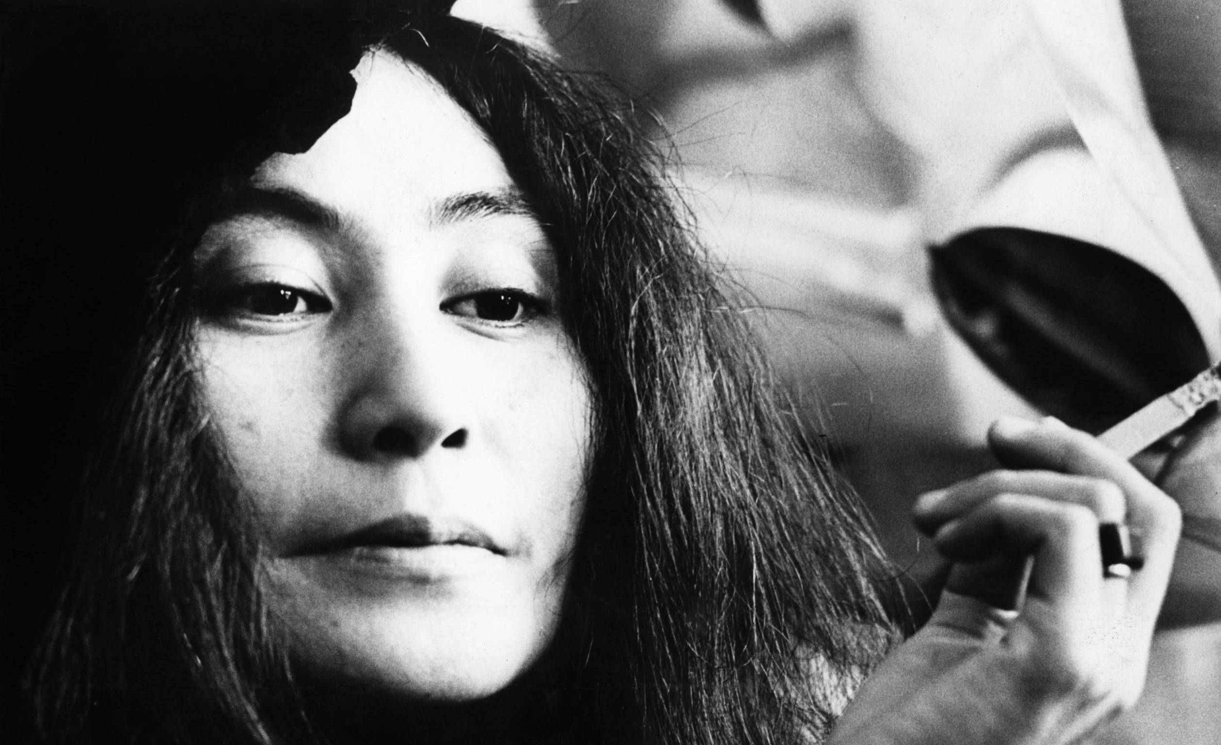 LONDON: Yoko Ono posed with a cigarette in Selfridges department store, Oxford Street, London in 1971 to promote the publi...
