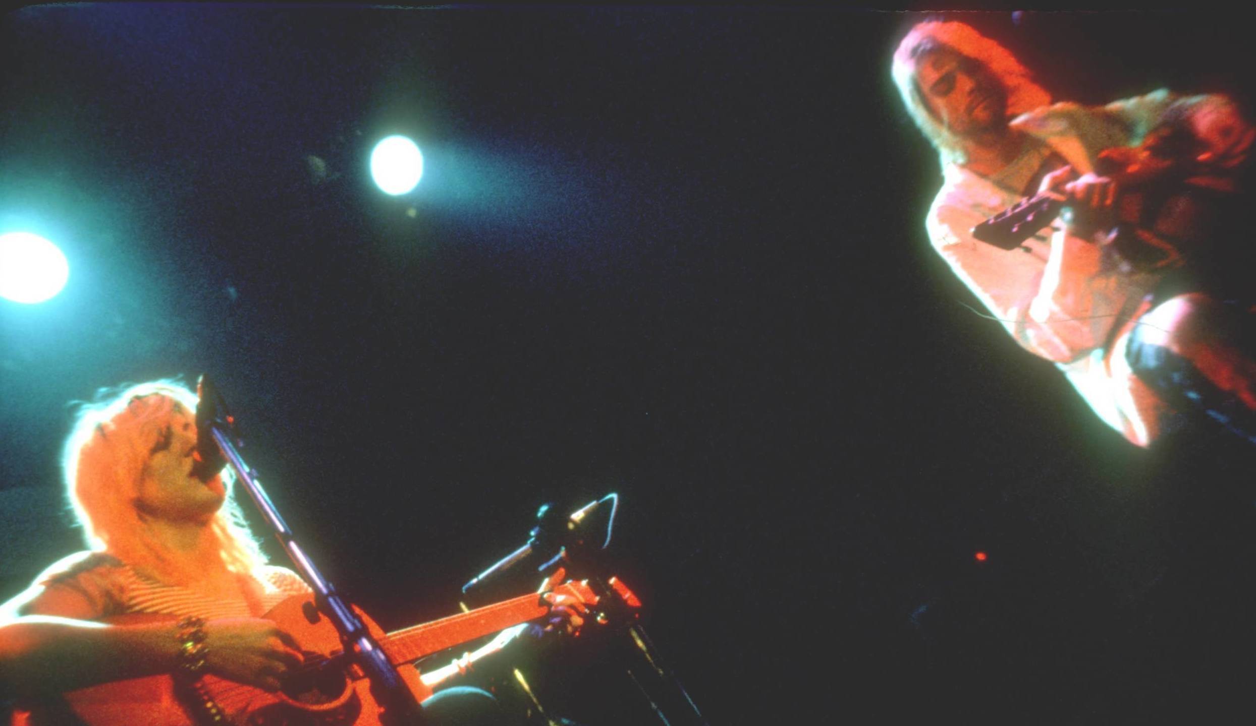 LOS ANGELES- September 8: Courtney Love and Kurt Cobain, both on acoustic guitar, perform together for Rock Against Rape a...