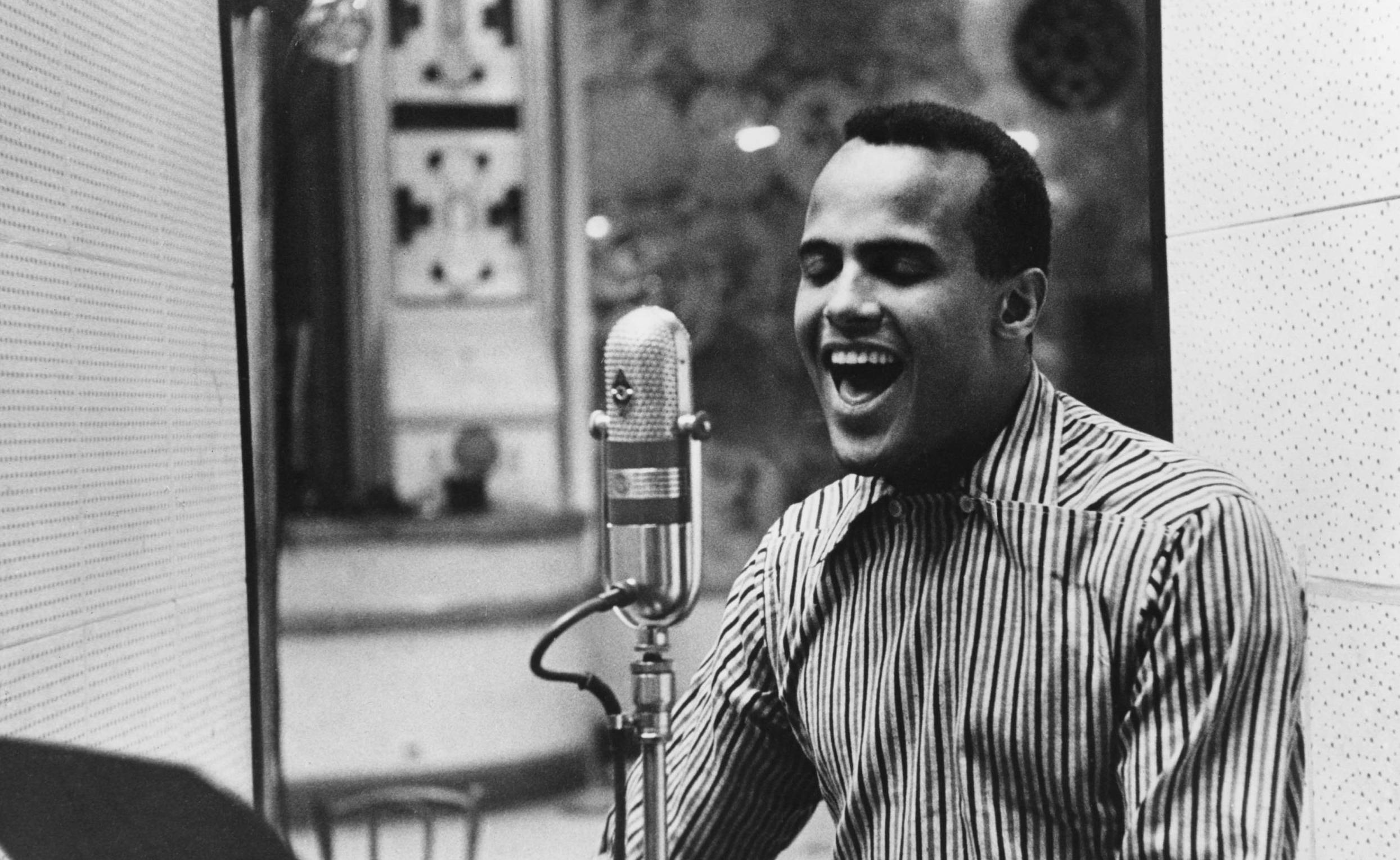 American singer Harry Belafonte performing in a recording studio, circa 1957.  (Photo by Pictorial Parade/Archive Photos/G...