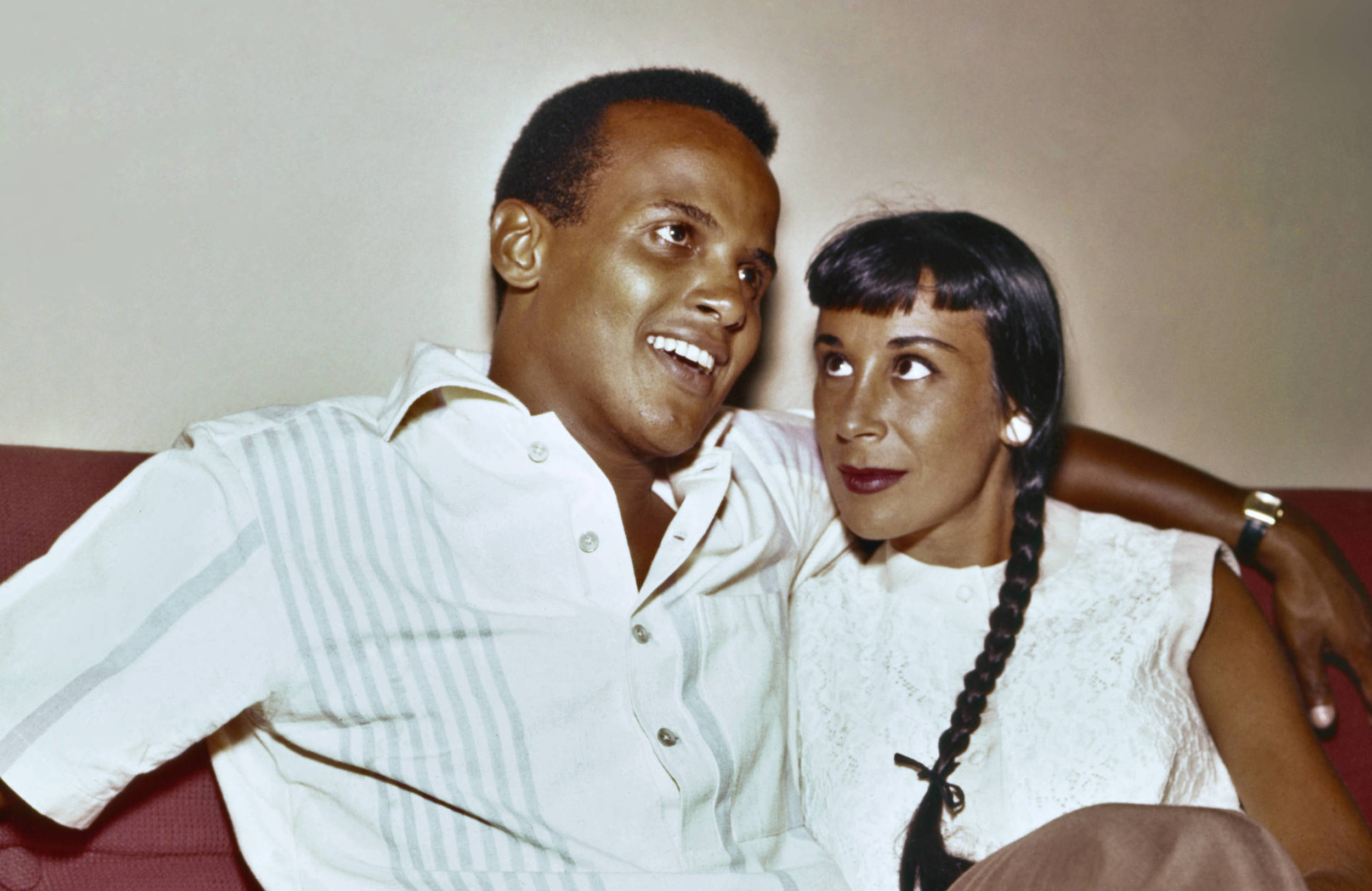 American actor and singer Harry Belafonte with his second wife dancer Julie Robinson in Hollywood in August 1957. (Photo b...