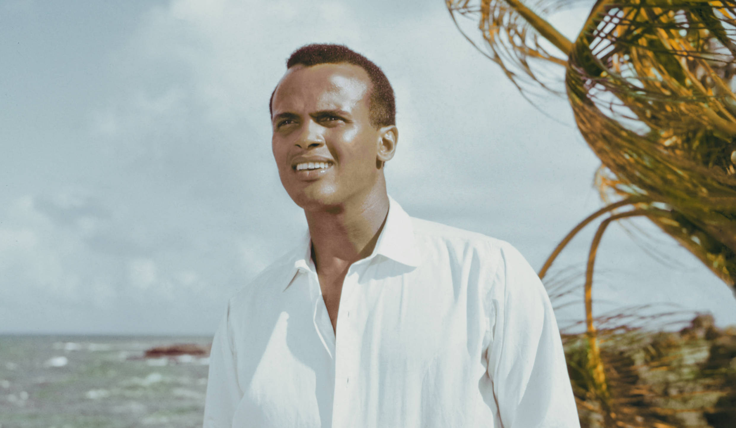 American actor and singer Harry Belafonte poses next to the ocean circa 1957. (Photo by Archive Photos/Getty Images)