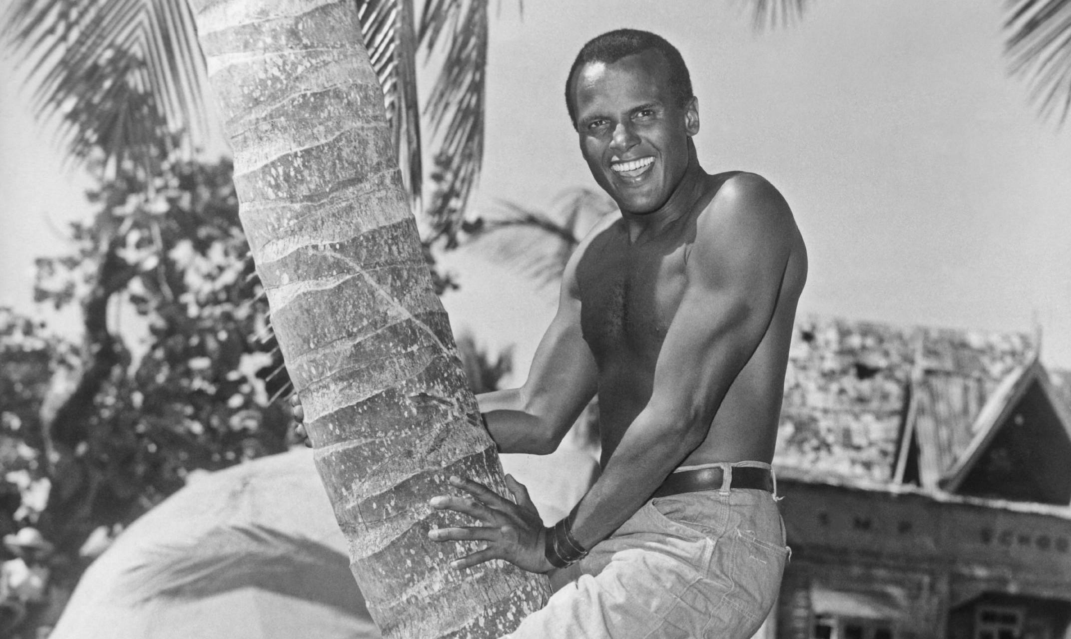 American actor and singer Harry Belafonte on the set of 'Island in the Sun' in Barbados in 1957. (Photo by Archive Photos/...