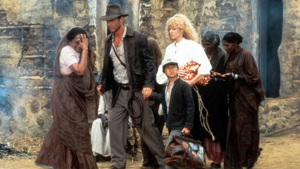 Harrison Ford, Ke Huy Quan und Kate Capshaw in „Indiana Jones und der Tempel des Todes“, 1984