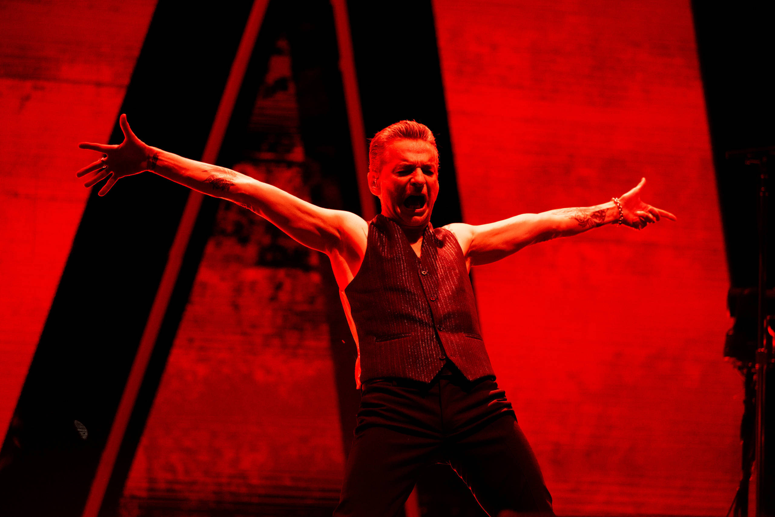 INGLEWOOD, CALIFORNIA - MARCH 28: Singer Dave Gahan of Depeche Mode performs onstage during the 'Memento Mori' tour at The...