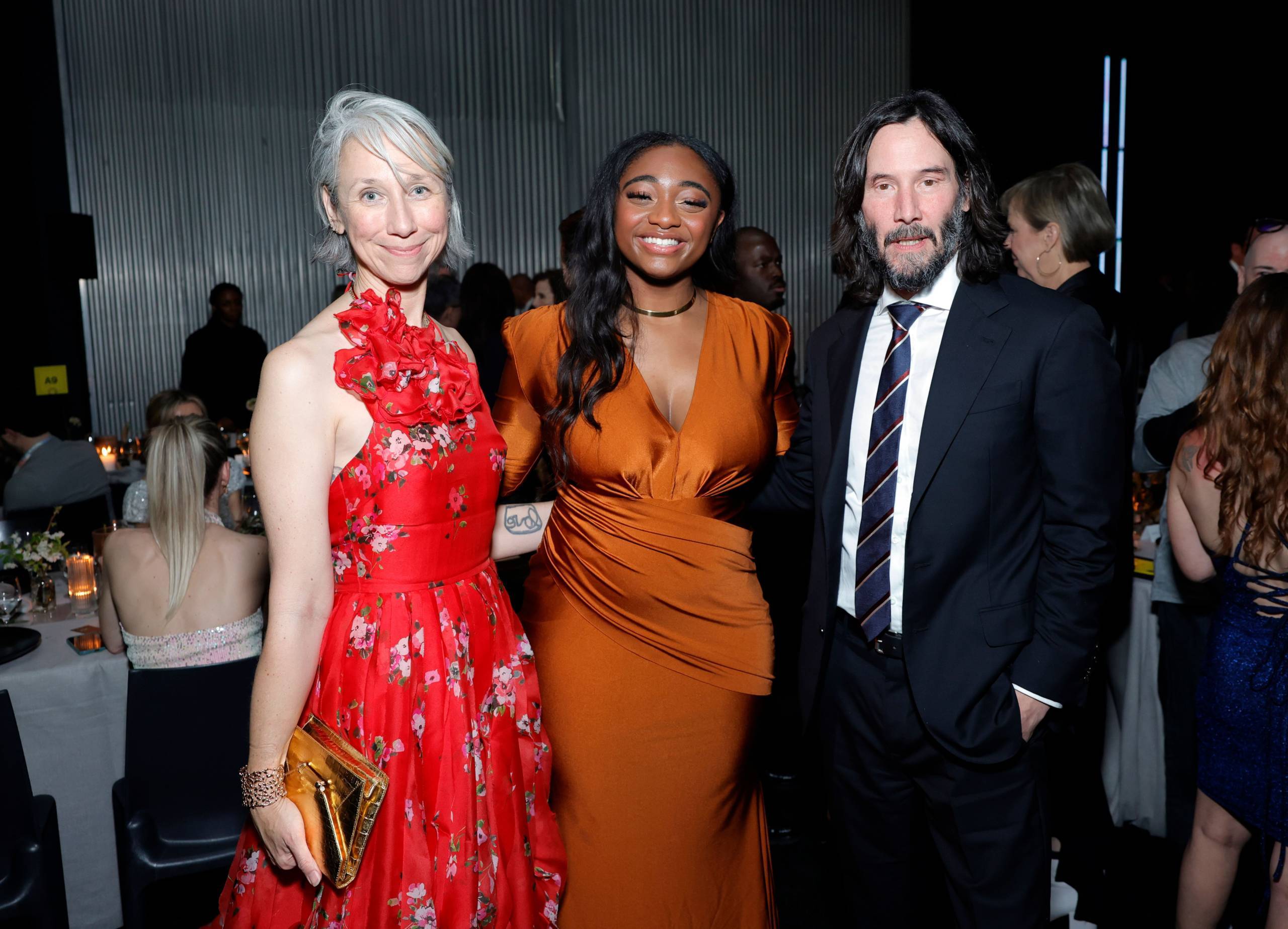 LOS ANGELES, CALIFORNIA - APRIL 15: (L-R) Alexandra Grant, Samara Joy aud Keanu Reeves