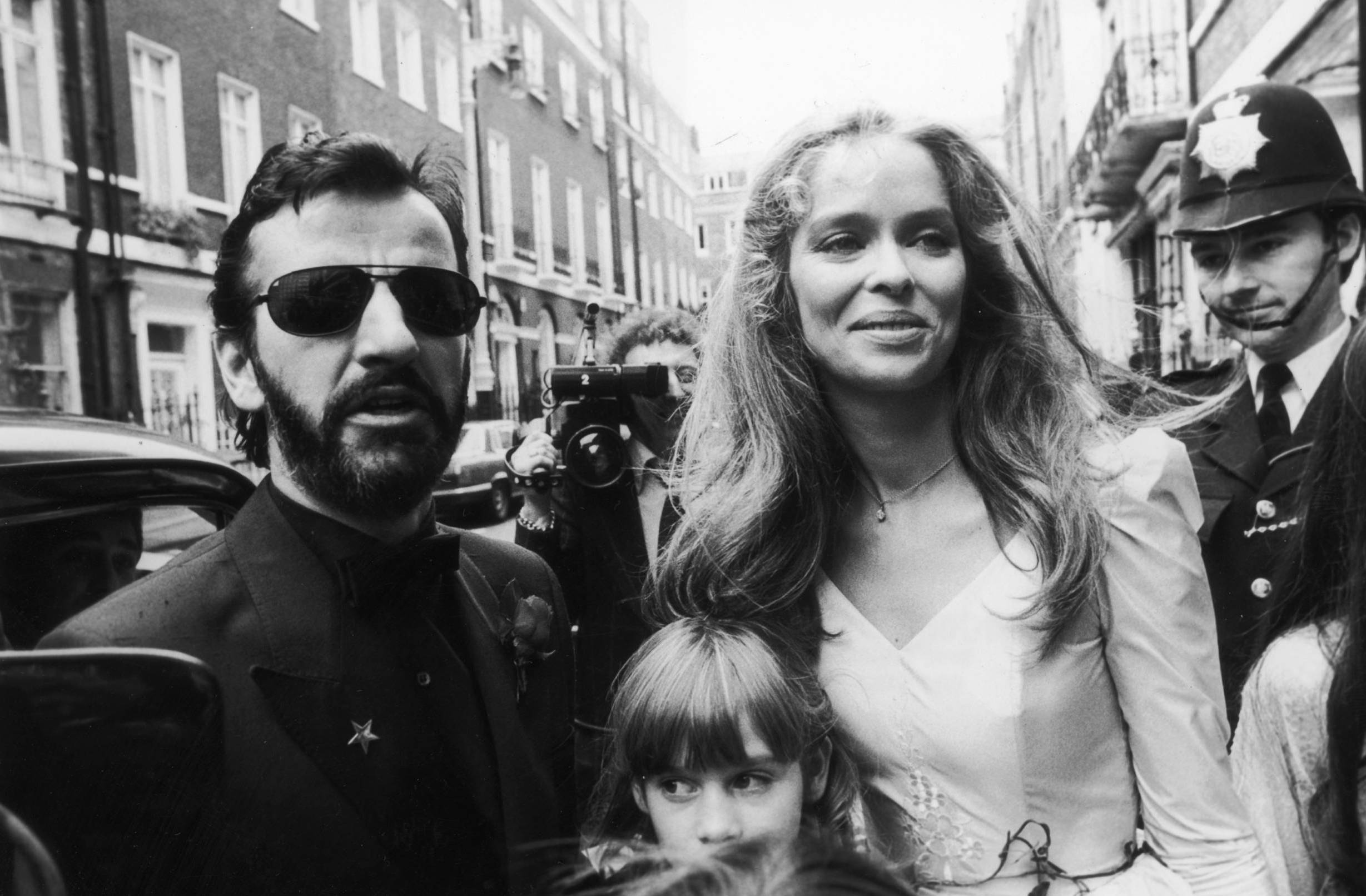 27th April 1981:  English musician and former Beatle Ringo Starr stands next to his smiling wife, American actress Barbara...