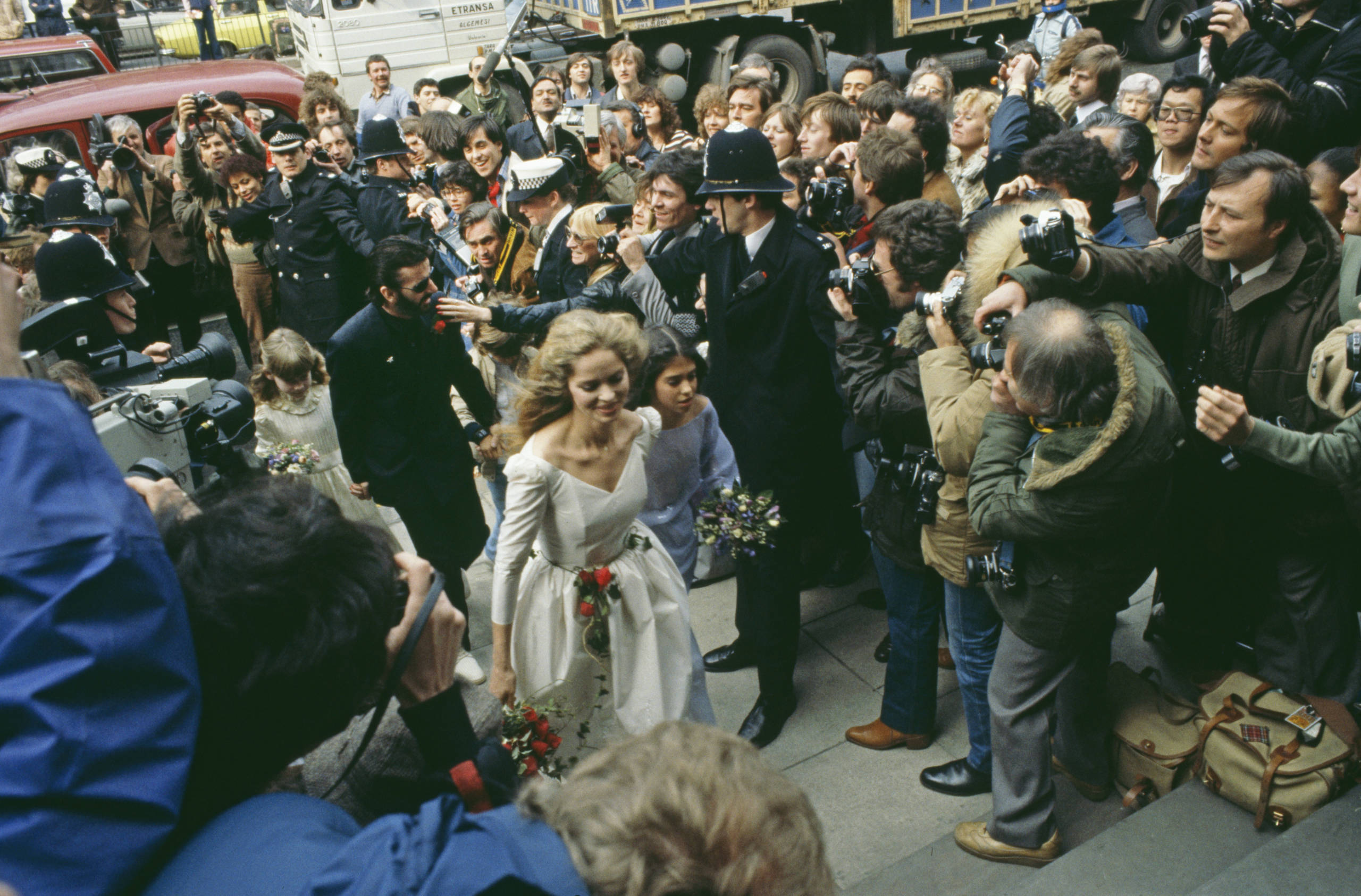 Former Beatle Ringo Starr (centre, left) and American actress Barbara Bach arriving at Marylebone Register Office for thei...