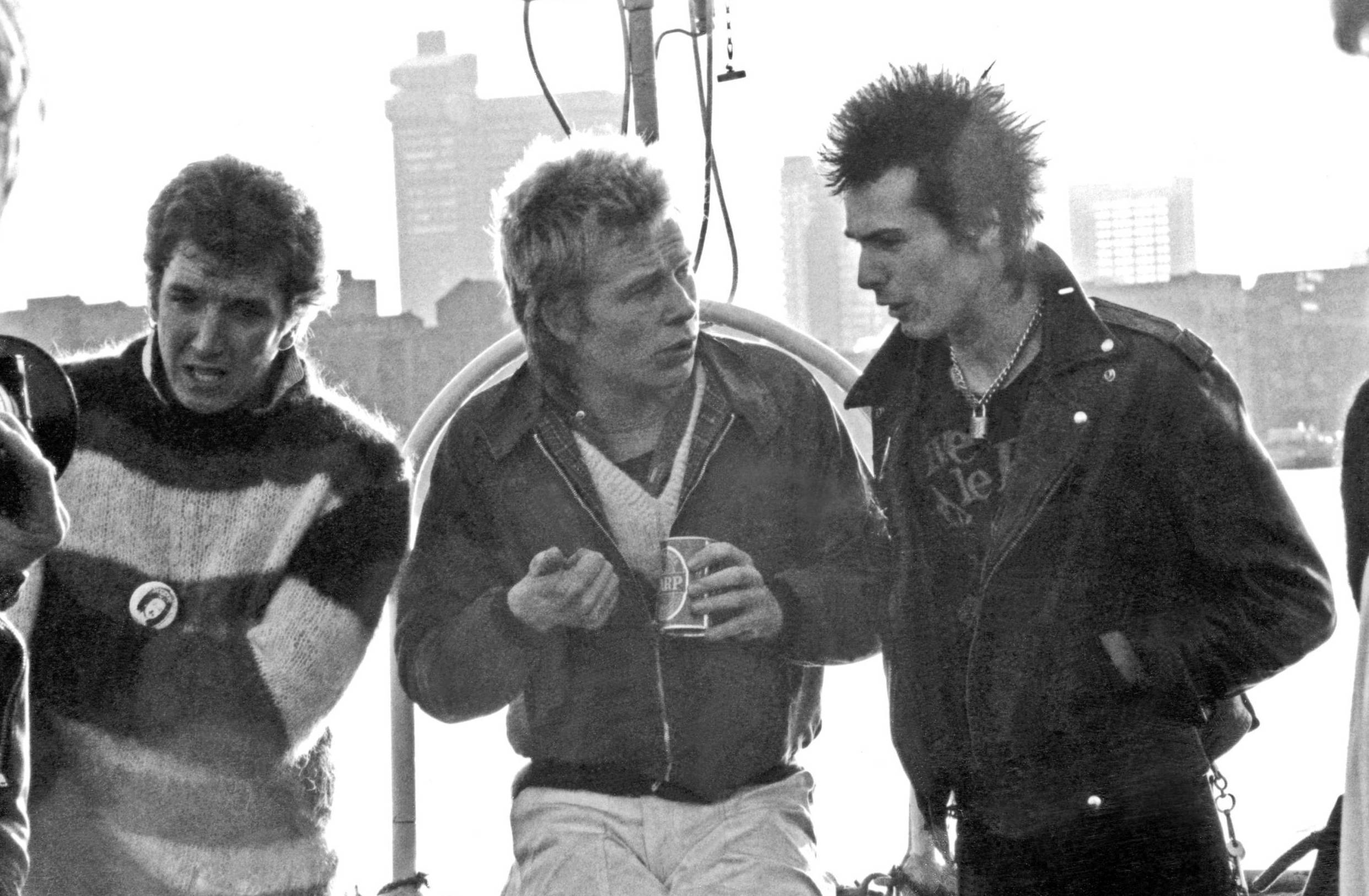 LONDON - JUNE 1977: L-R Steve Jones, Paul Cook and Sid Vicious (John Ritchie - 1957 - 1979) of English punk rock band the ...