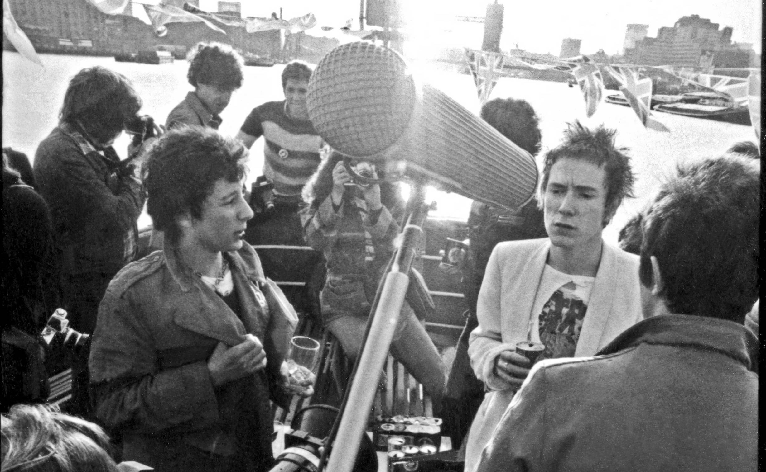 LONDON - JUNE 1977: Johnny Rotten (John Lydon) of English punk rock band the Sex Pistols being interviewed aboard the Quee...