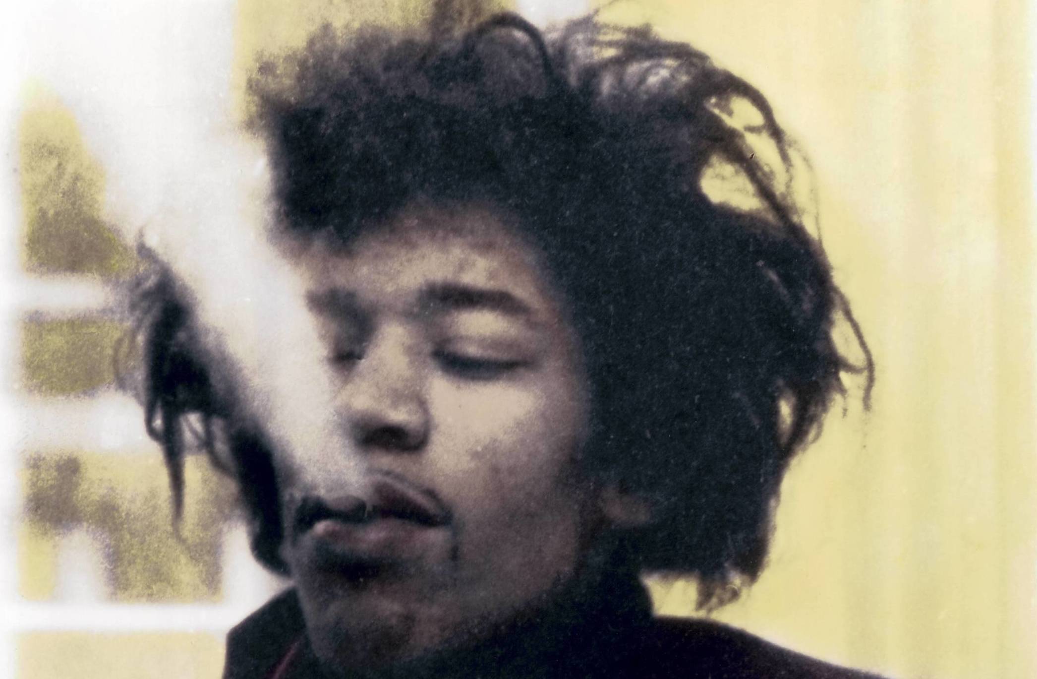 Jimi Hendrix (1942-1970) smoking cigarette  (Photo by Jan Olofsson/Redferns)