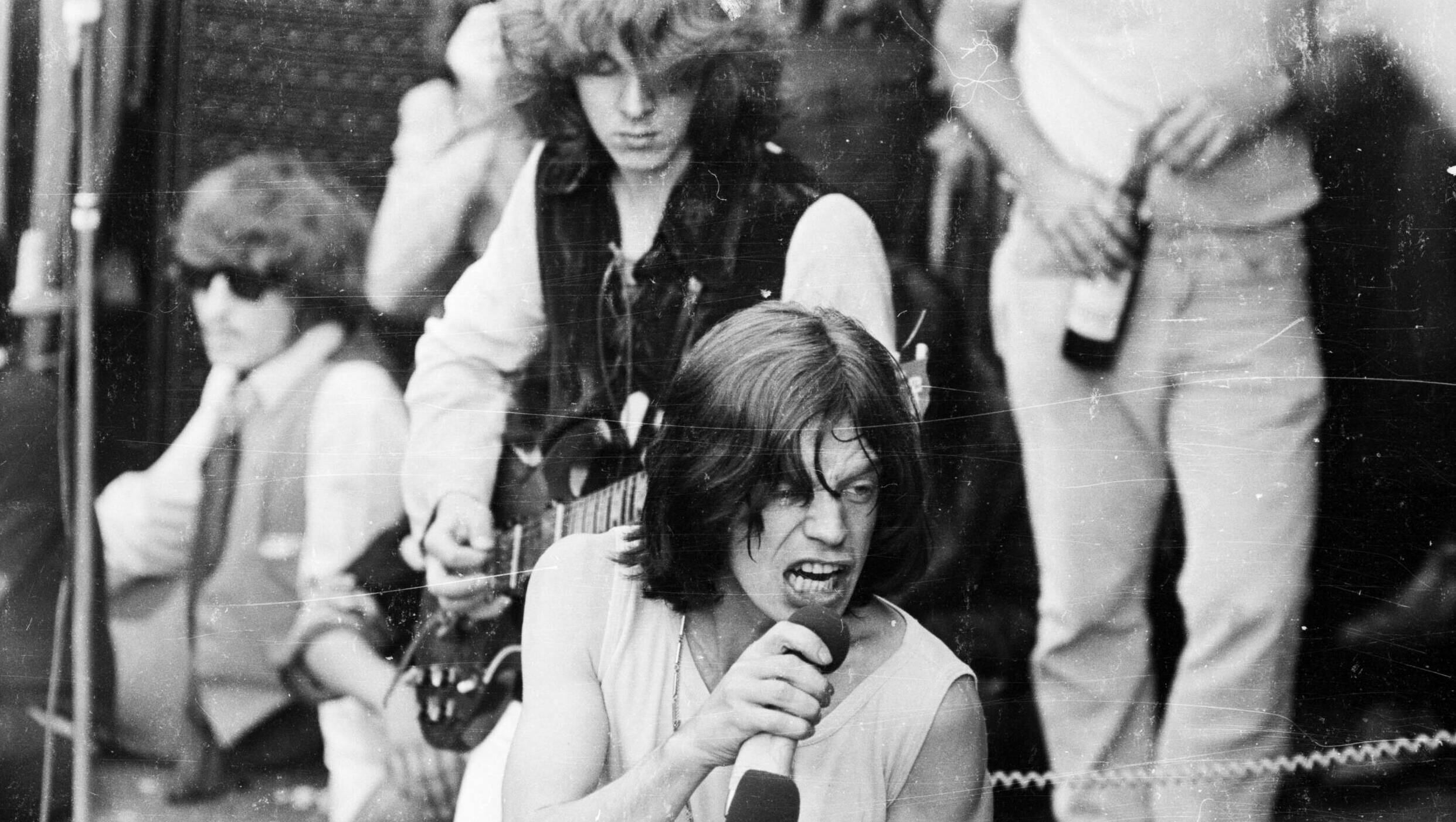 5th July 1969:  Vocalist Mick Jagger and guitarist Mick Taylor in concert with the Rolling Stones in London's Hyde Park. T...