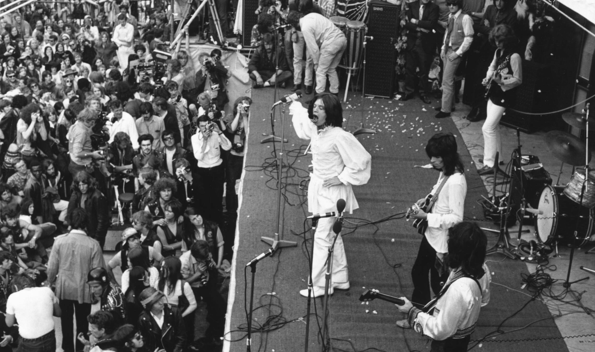 5th July 1969:  British rock singer Mick Jagger, performing with The Rolling Stones, at the free open-air concert in Hyde ...