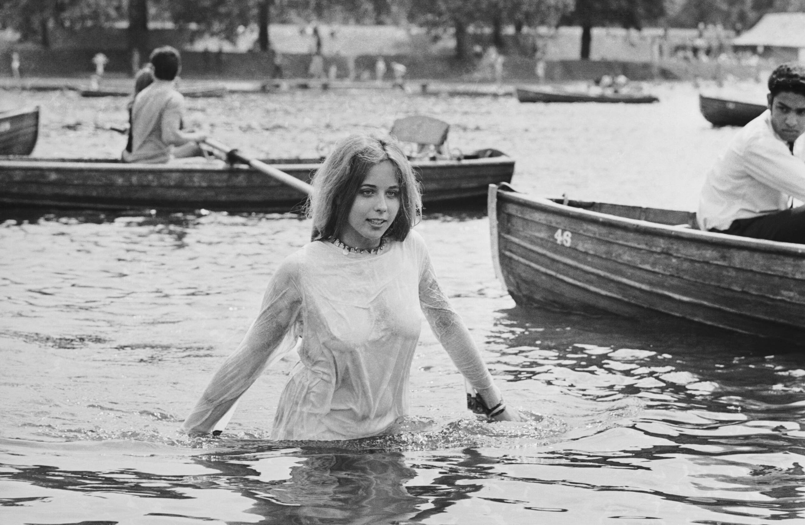 A teenage girl cooling off in the Serpentine during the Rolling Stones concert in Hyde Park, London, 5th July 1969. (Photo...