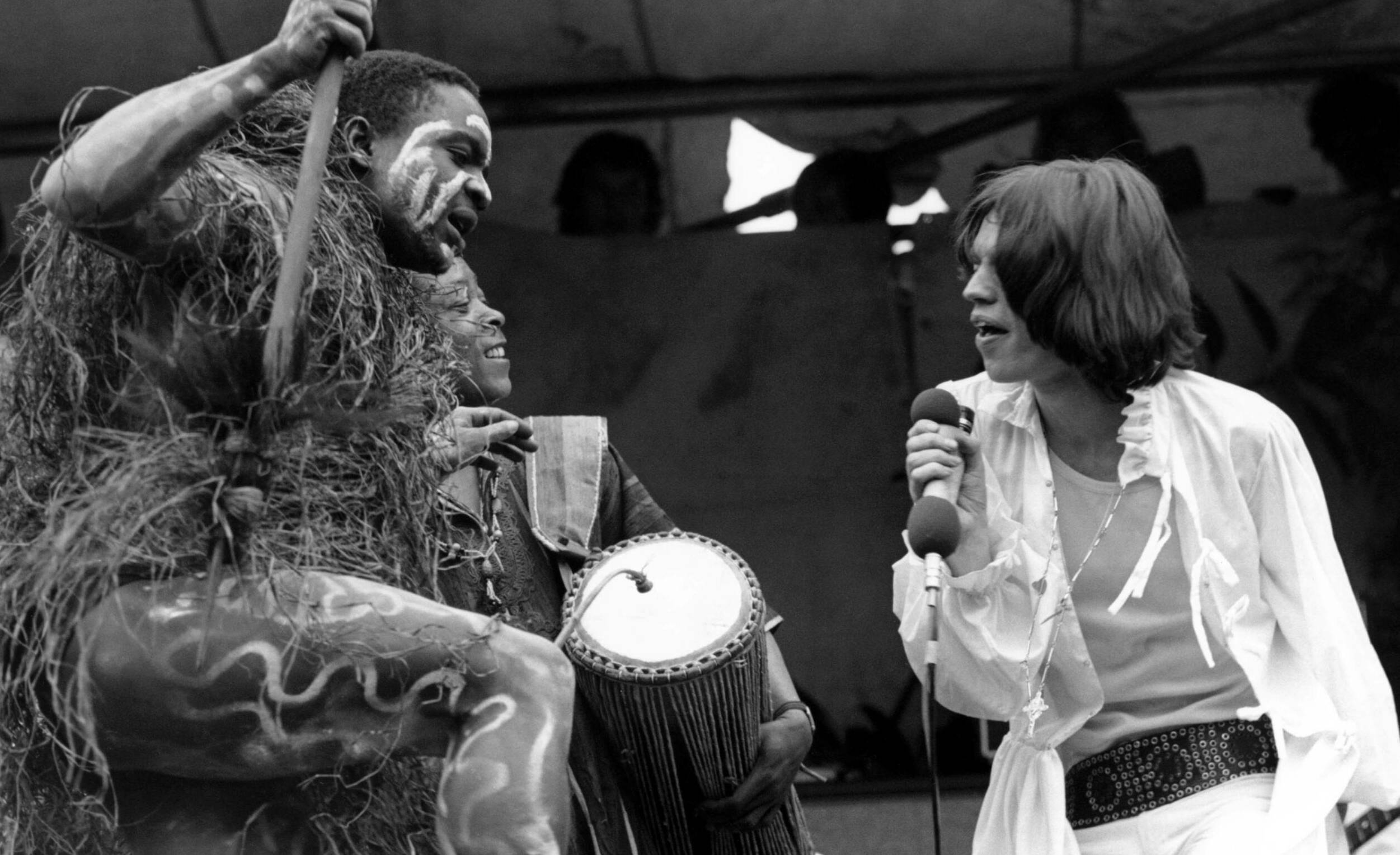 UNITED KINGDOM - JULY 05:  HYDE PARK  Photo of Mick JAGGER and ROLLING STONES, Mick Jagger on stage with African drummers ...