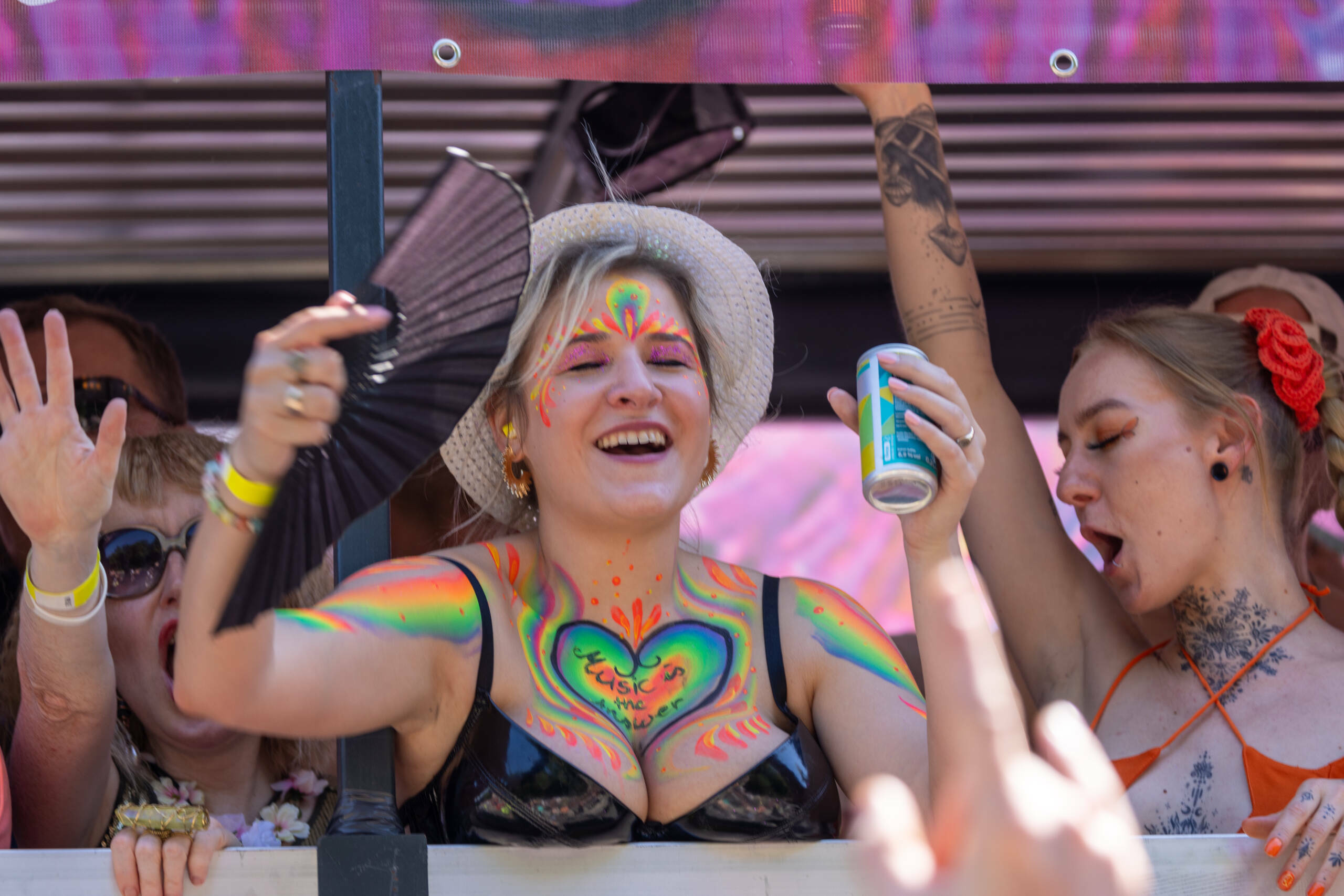 BERLIN, GERMANY - JULY 8: Techno music enthusiasts dance during the Rave the Planet parade in Tiergarten park at victory c...