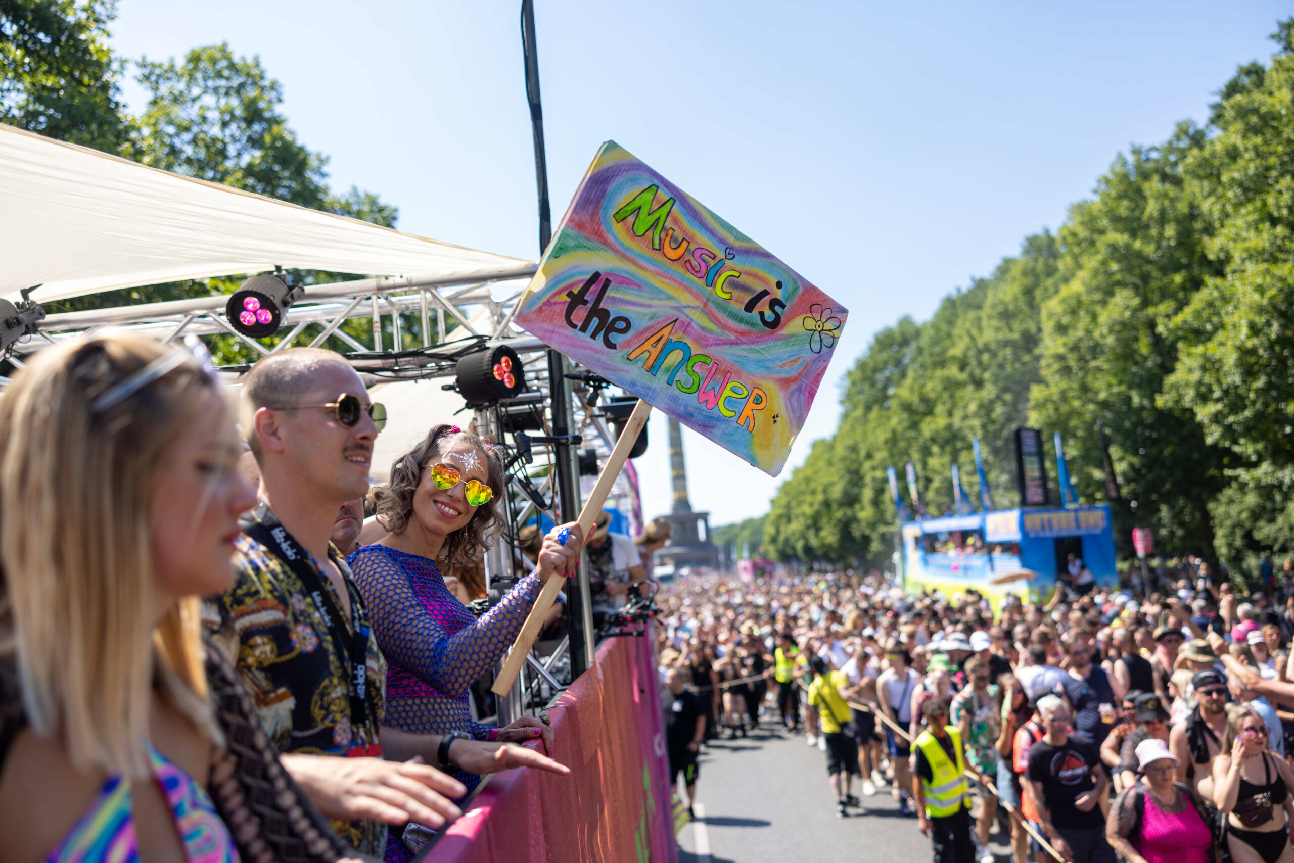 BERLIN, GERMANY - JULY 8: Techno music enthusiasts dance during the Rave the Planet parade in Tiergarten park on July 8, 2...