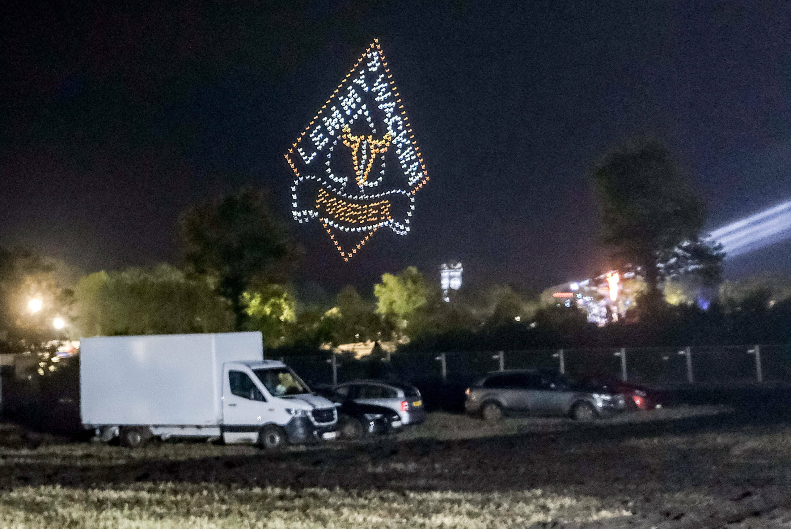 The lettering "Lemmy Wacken forever" is projected with drones over the festival site of the Wacken Open Air music festival...
