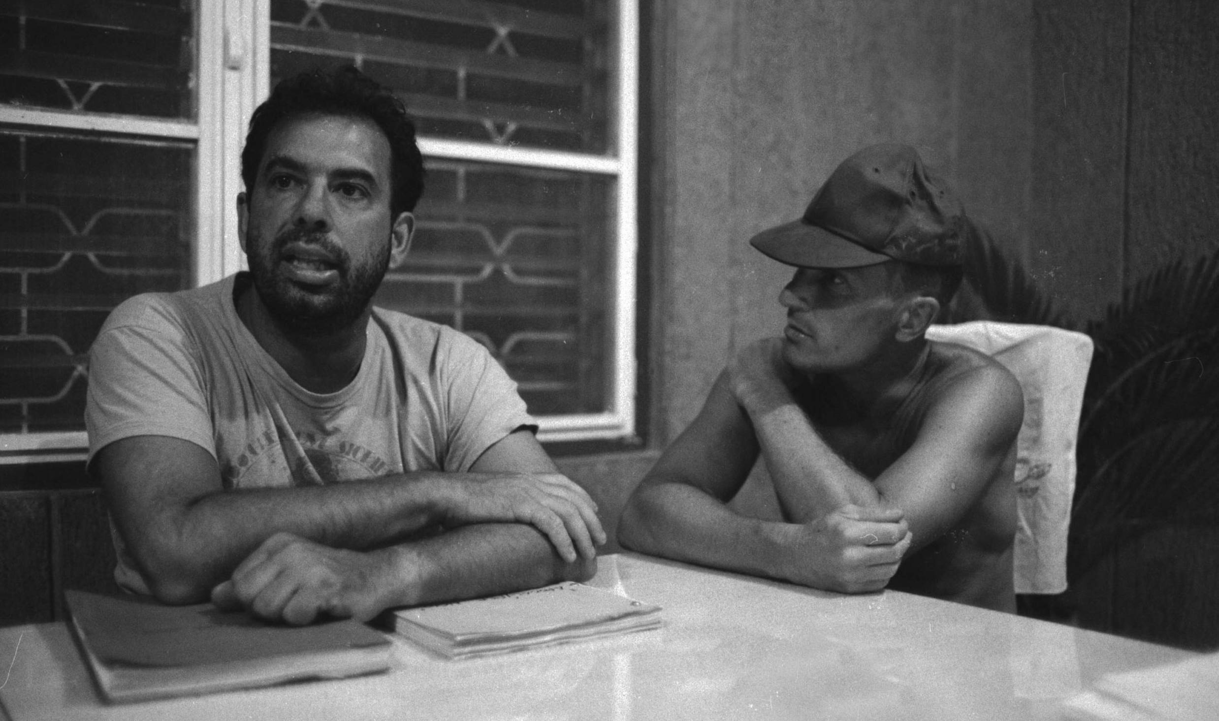 025412 21: Director Francis Ford Coppola (L) and actor Robert Duvall go over a script during rehearsals for his Vietnam Wa...