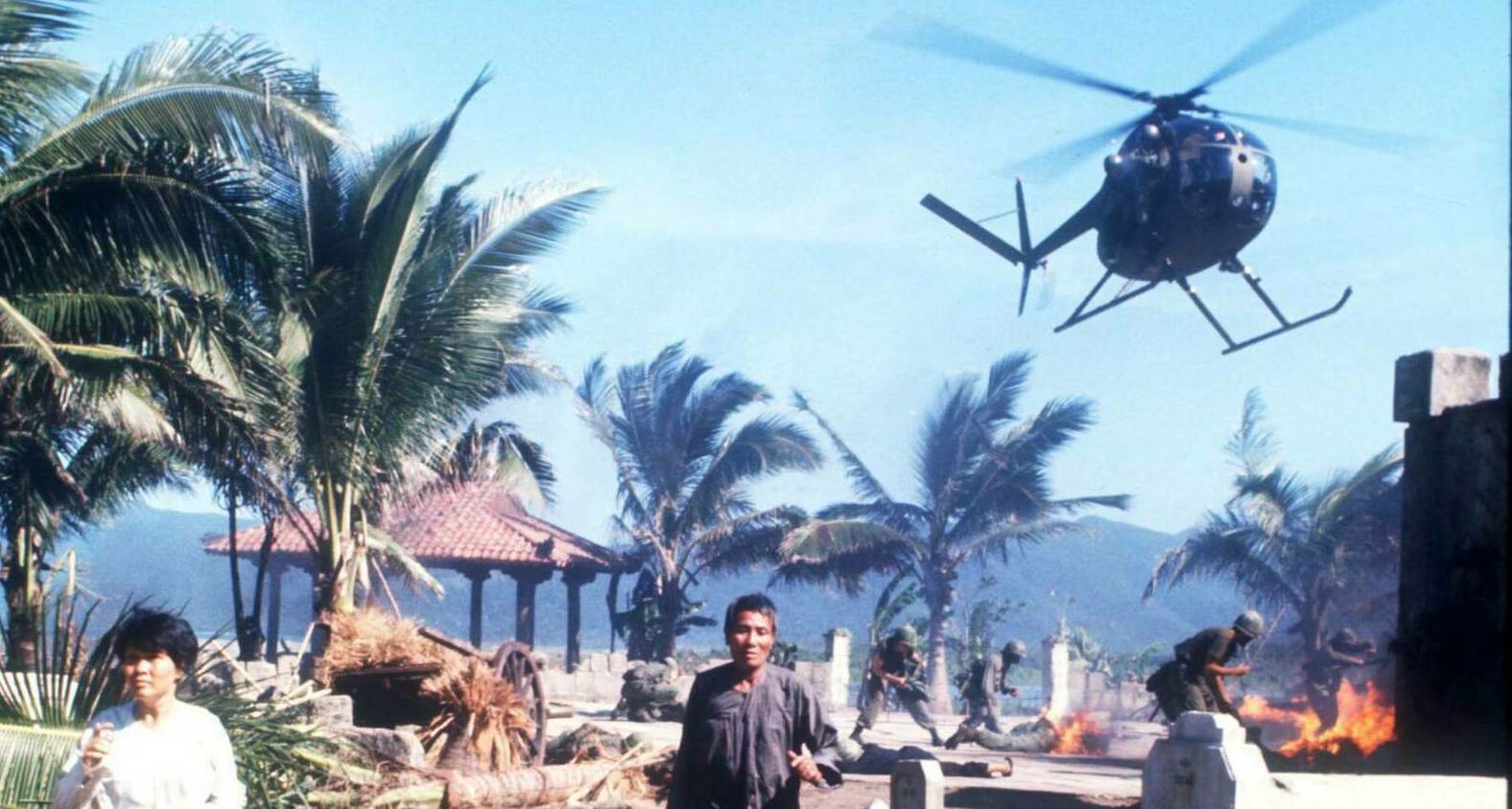 25412 06: Two unidentified actors run April 28, 1976 during the filming of "Apocalypse Now" in the Philippines. The movie ...