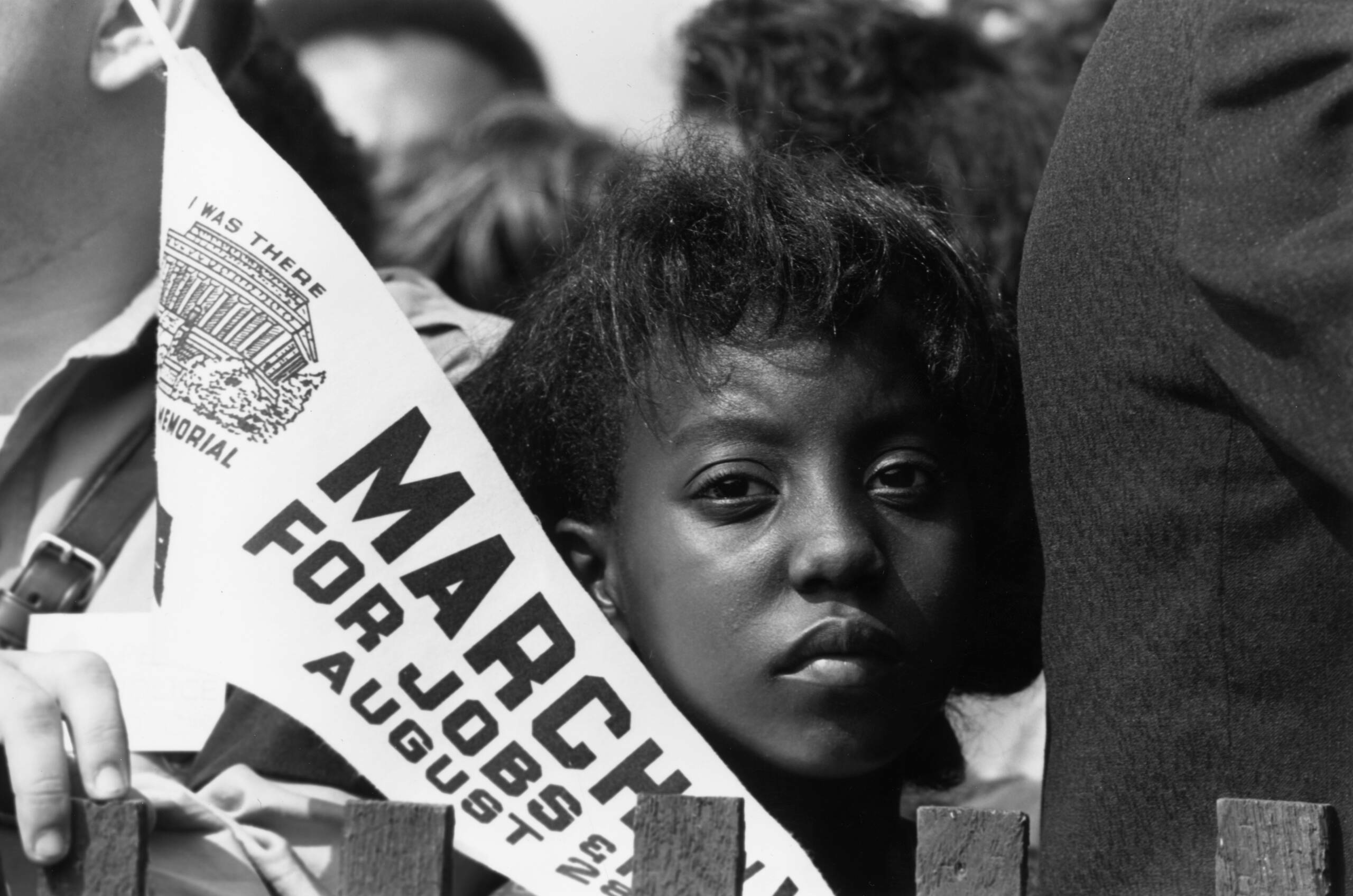 28th August 1963:  A young marcher during the march for jobs and freedom to the Lincoln Memorial in Washington DC, where M...