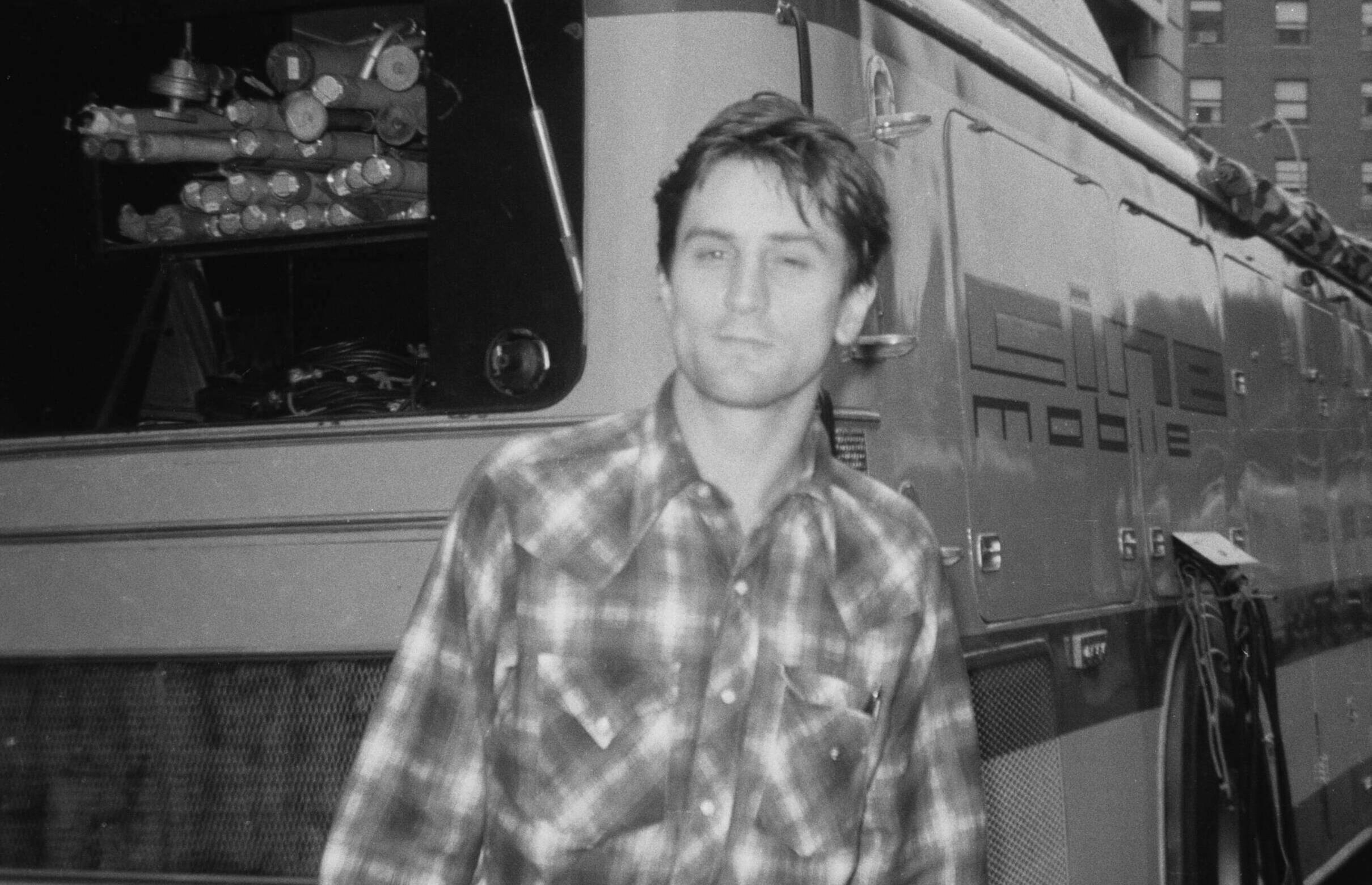 American actor Robert De Niro wearing a plaid shirt on the set of the film 'Taxi Driver,' in New York City, New York, 1975...