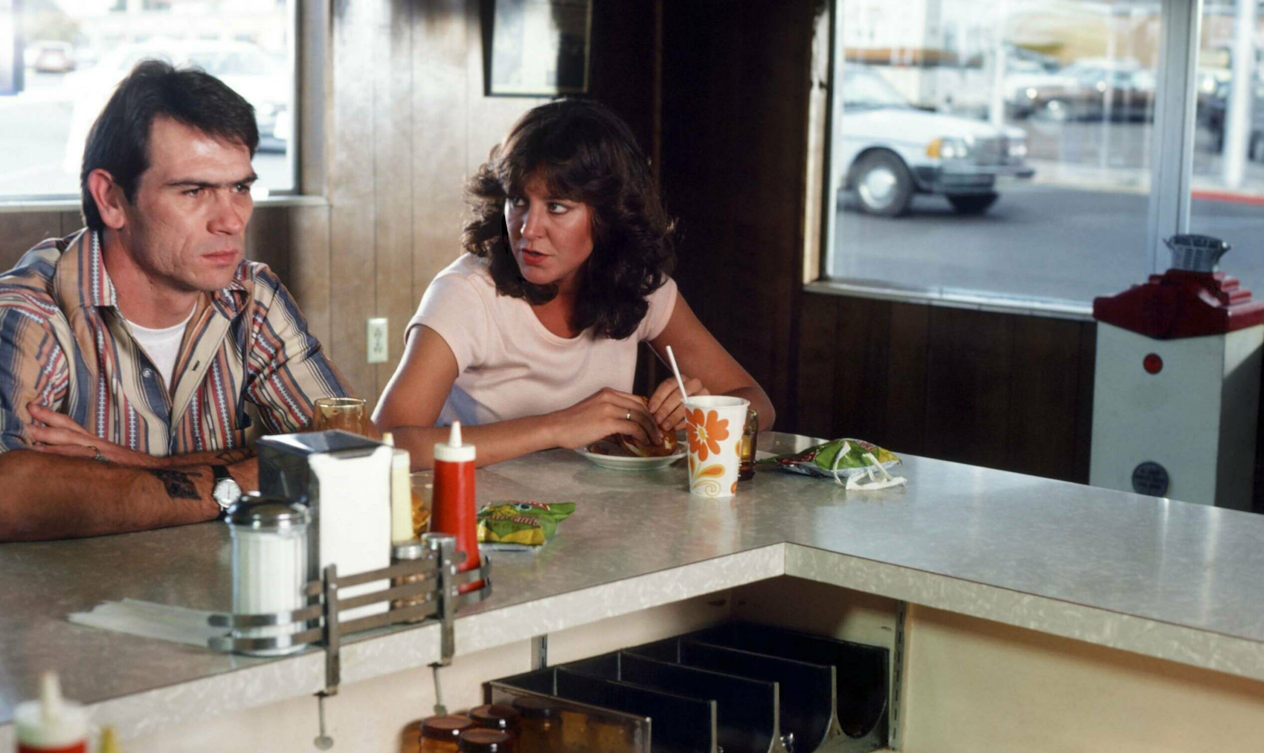 THE EXECUTIONER'S SONG -- Pictured: (l-r) Tommy Lee Jones as Gary Mark Gilmore, Christine Lahti as Brenda Nicol -- Photo b...