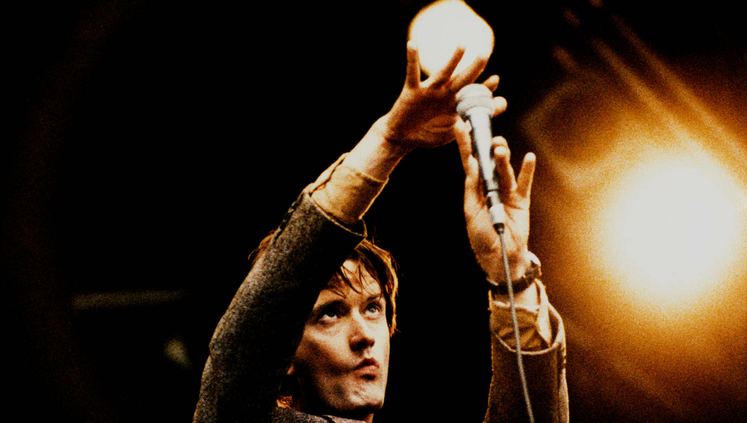 Jarvis Cocker, Pulp, performing on stage, Glastonbury Festival, United Kingdom, 26th June 1994. (Photo by Niels van Iperen...