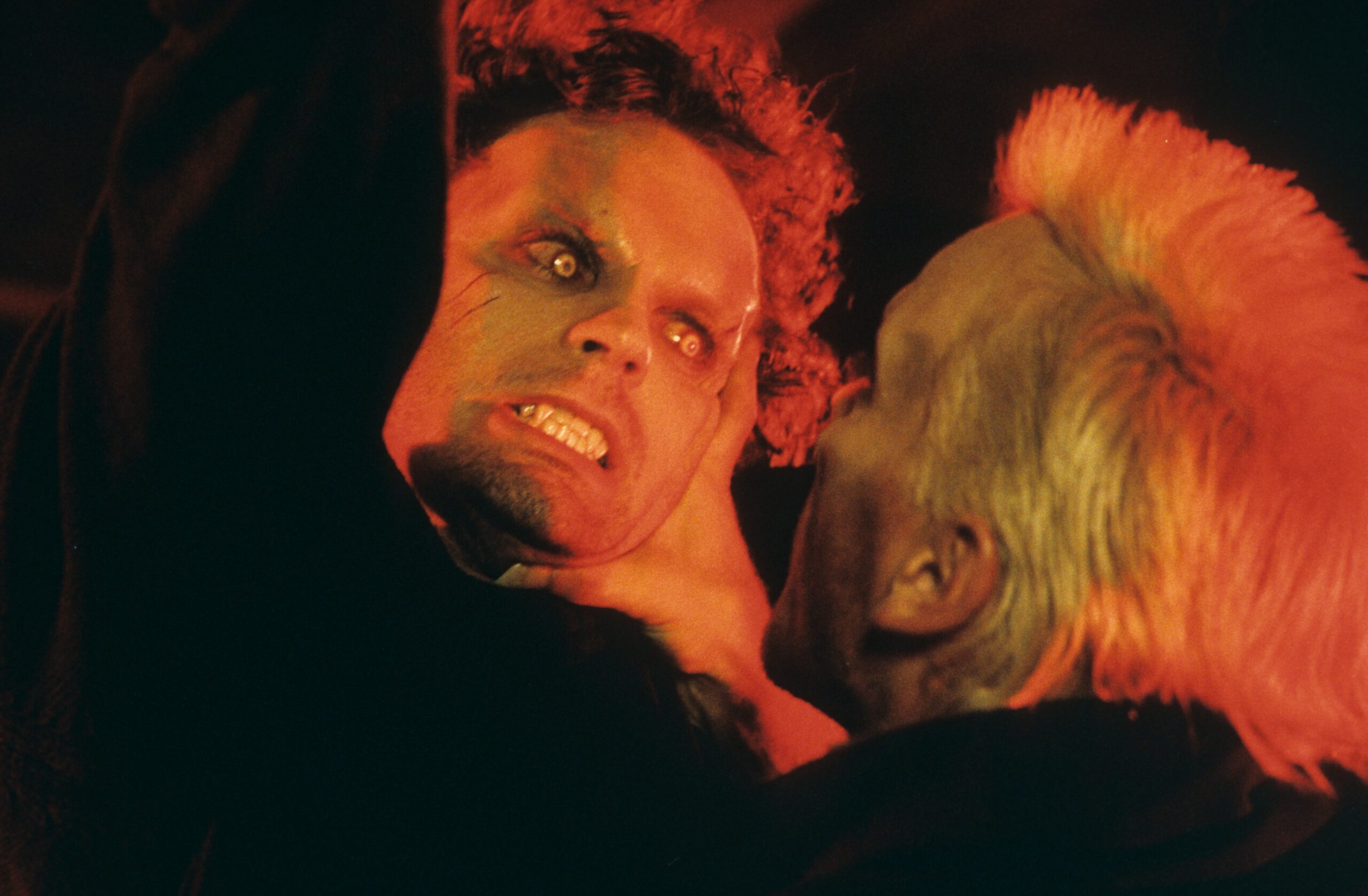 Kiefer Sutherland grabbing Jason Patric by the face in a scene from the film 'The Lost Boys', 1987. (Photo by Warner Broth...