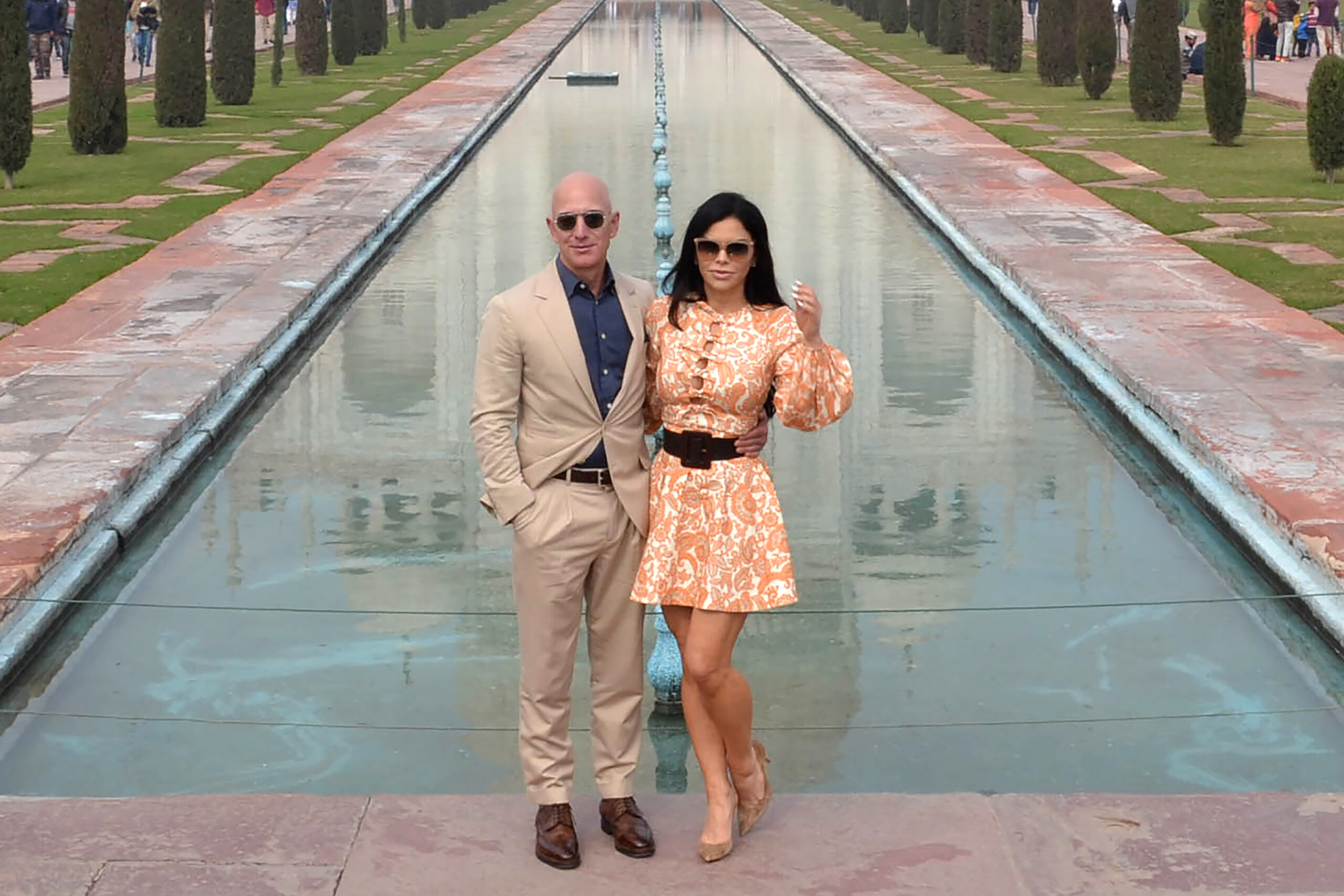 TOPSHOT - Chief Executive Officer of Amazon Jeff Bezos (L) and his girlfriend Lauren Sanchez pose for a picture during the...