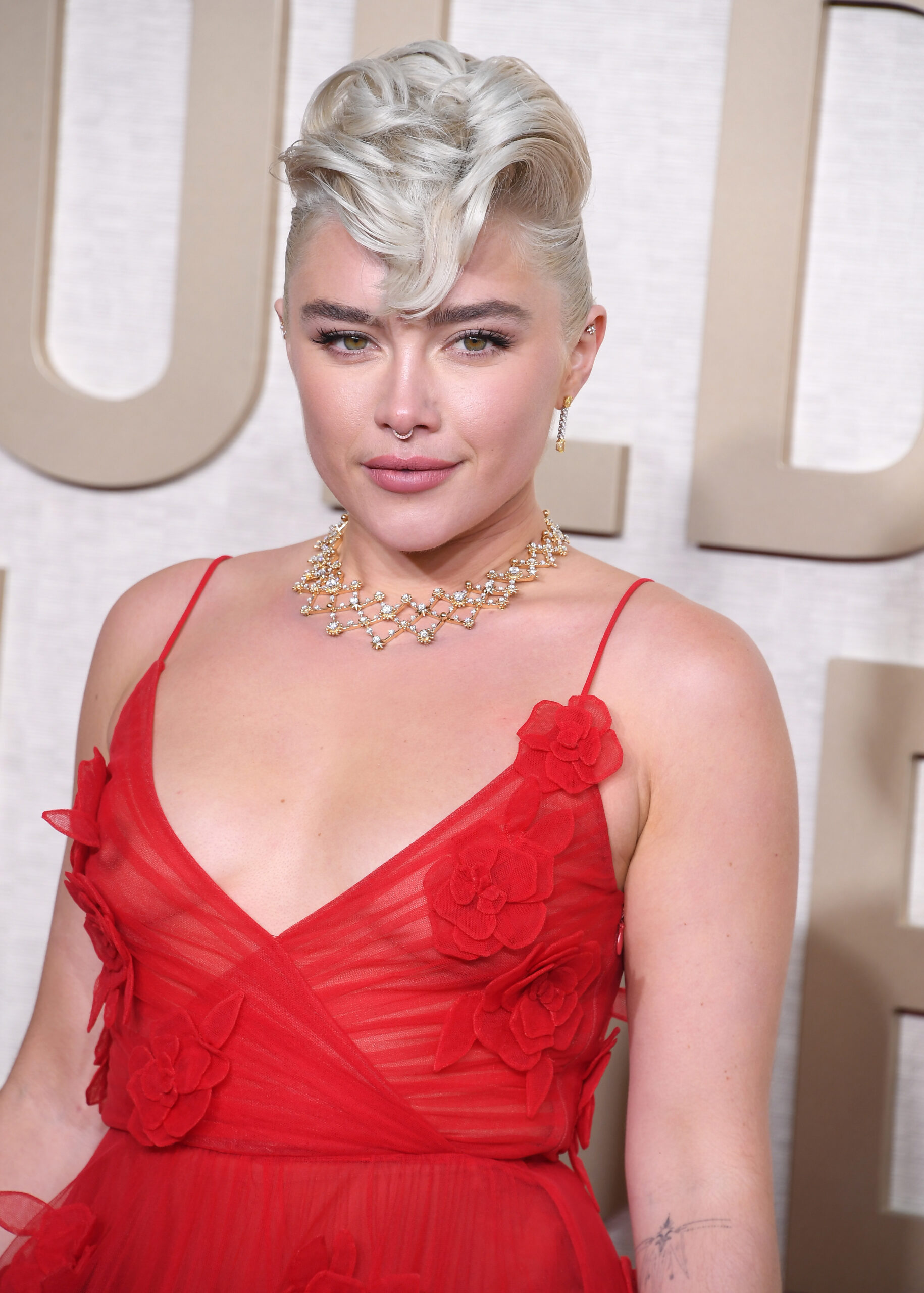 BEVERLY HILLS, CALIFORNIA - JANUARY 07: Florence Pugh arrives at the 81st Annual Golden Globe Awards  at The Beverly Hilto...