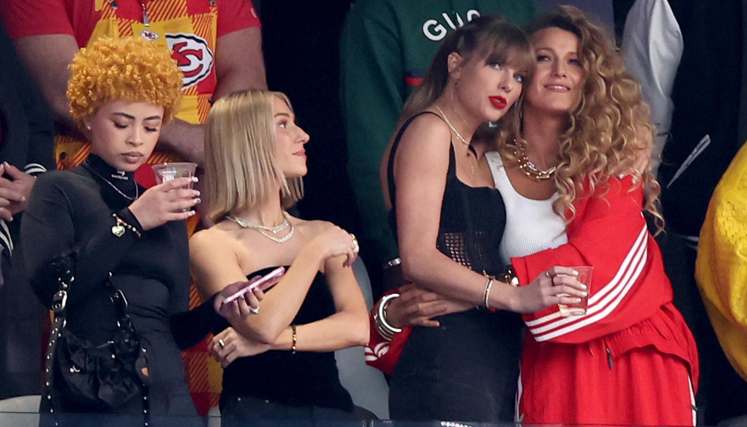 LAS VEGAS, NEVADA - FEBRUARY 11: Singer Taylor Swift and Actress Blake Lively hug prior to Super Bowl LVIII between the Sa...