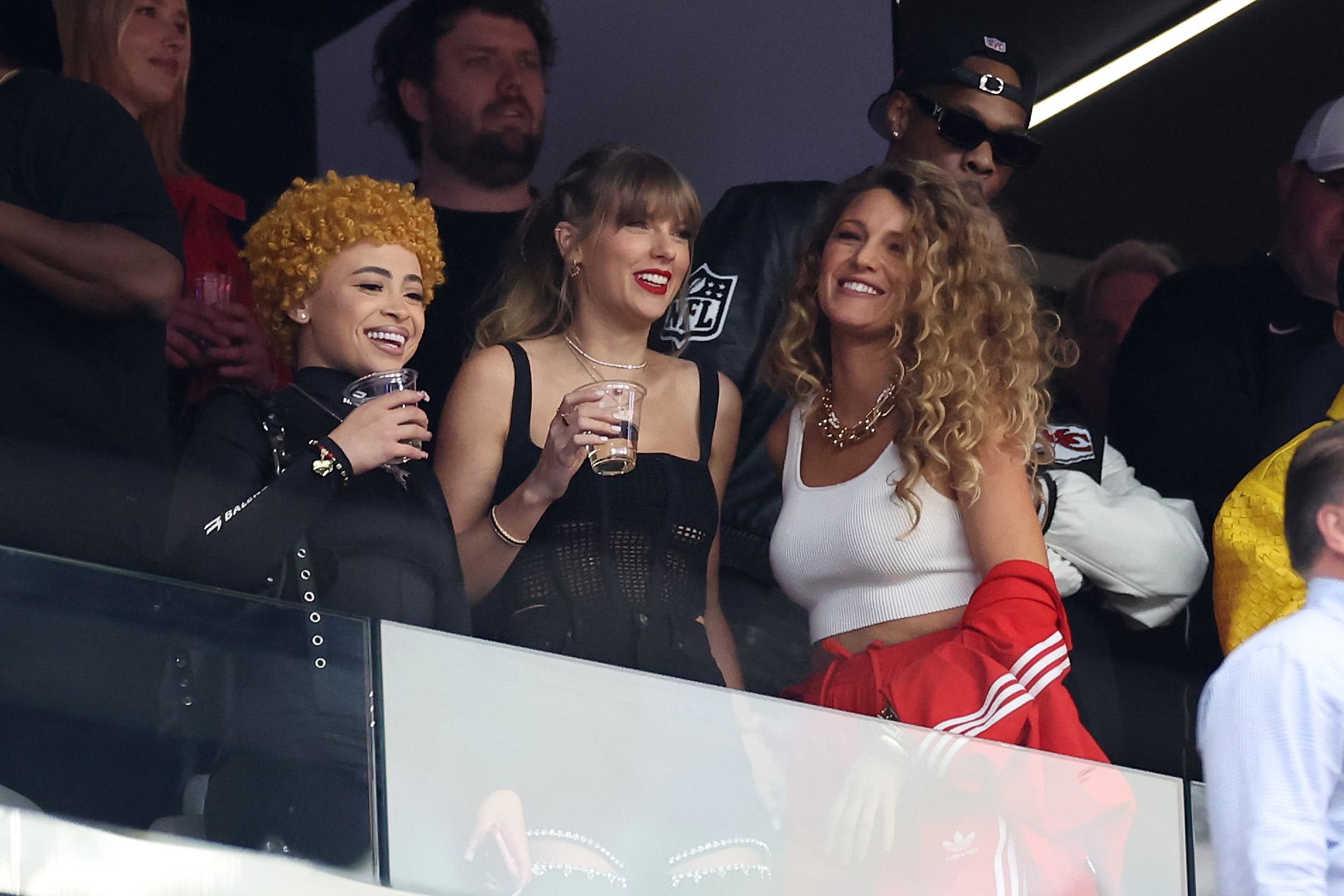 LAS VEGAS, NEVADA - FEBRUARY 11: Singer Taylor Swift and Actress Blake Lively react prior to Super Bowl LVIII between the ...