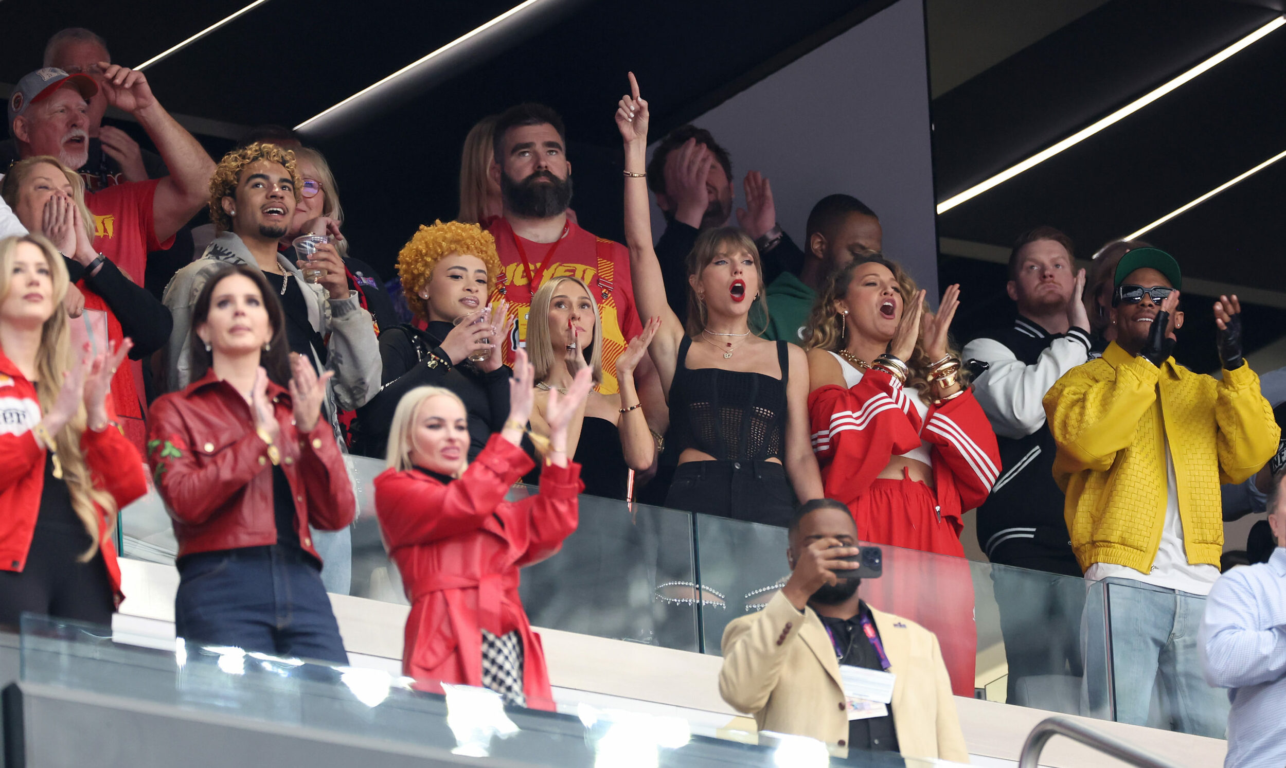 LAS VEGAS, NEVADA - FEBRUARY 11: Singer Taylor Swift and Actress Blake Lively react prior to Super Bowl LVIII between the ...