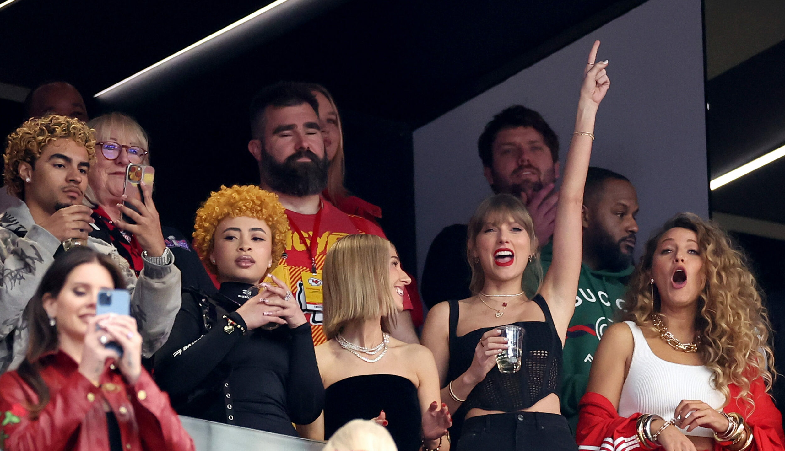 LAS VEGAS, NEVADA - FEBRUARY 11: Singer Taylor Swift and Actress Blake Lively react prior to Super Bowl LVIII between the ...