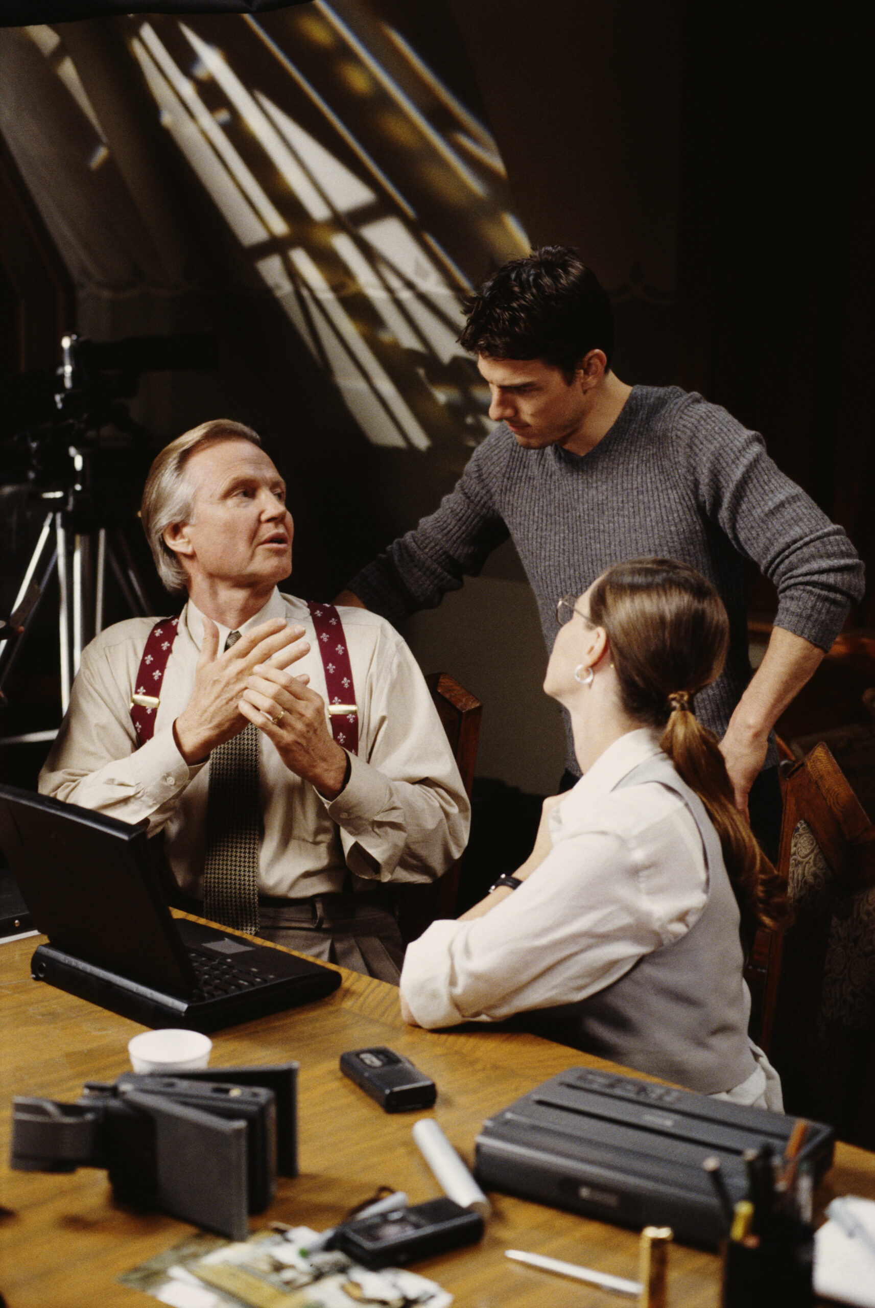 Actors Tom Cruise as Ethan Hunt, Emmanuelle Beart as Claire Phelps and Jon Voight as Jim Phelps on the set of the film 'Mi...