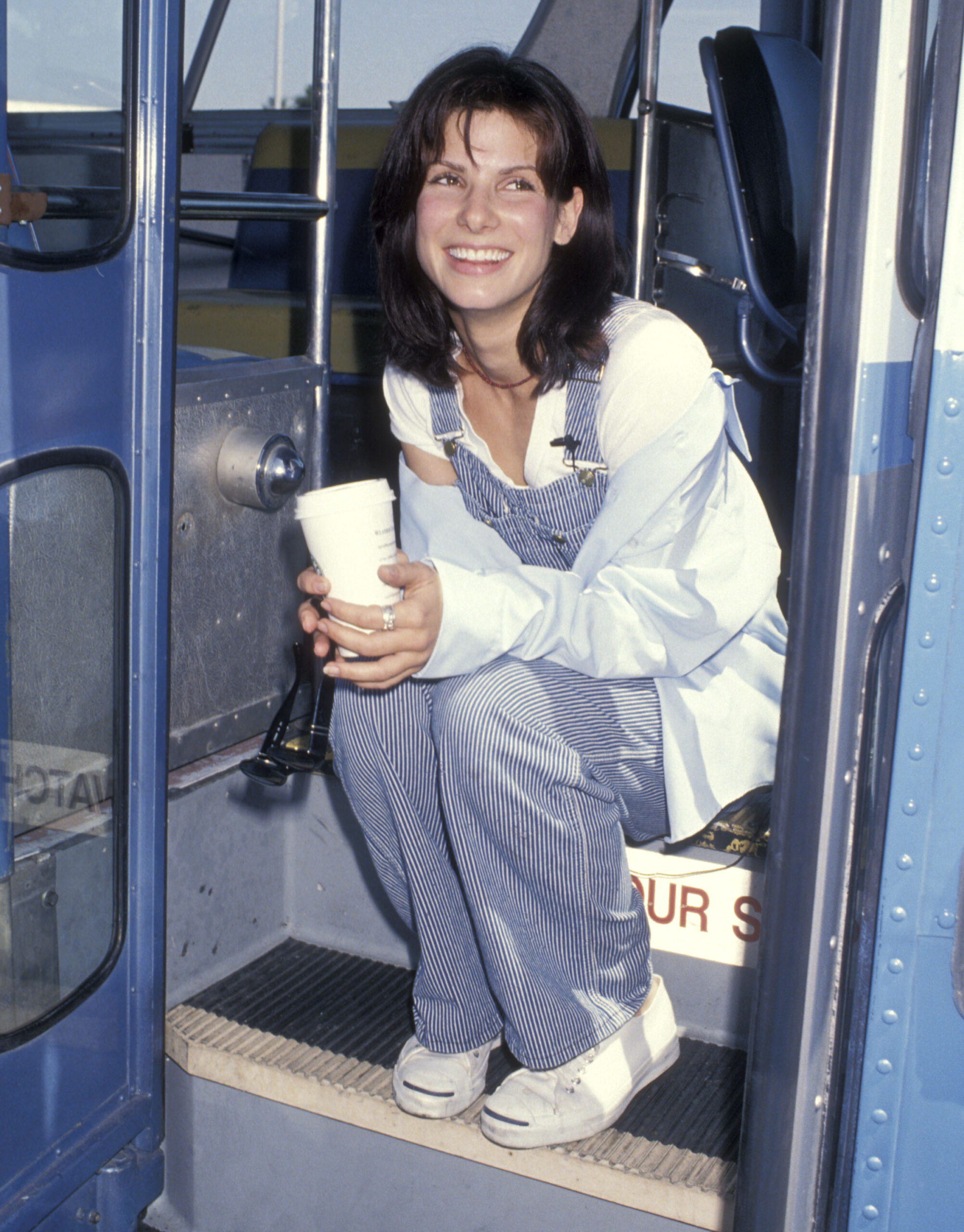 Actress Sandra Bullock takes a bus driver's test to promote her new movie 'Speed' on June 1, 1994 at the Santa Monica Bus ...