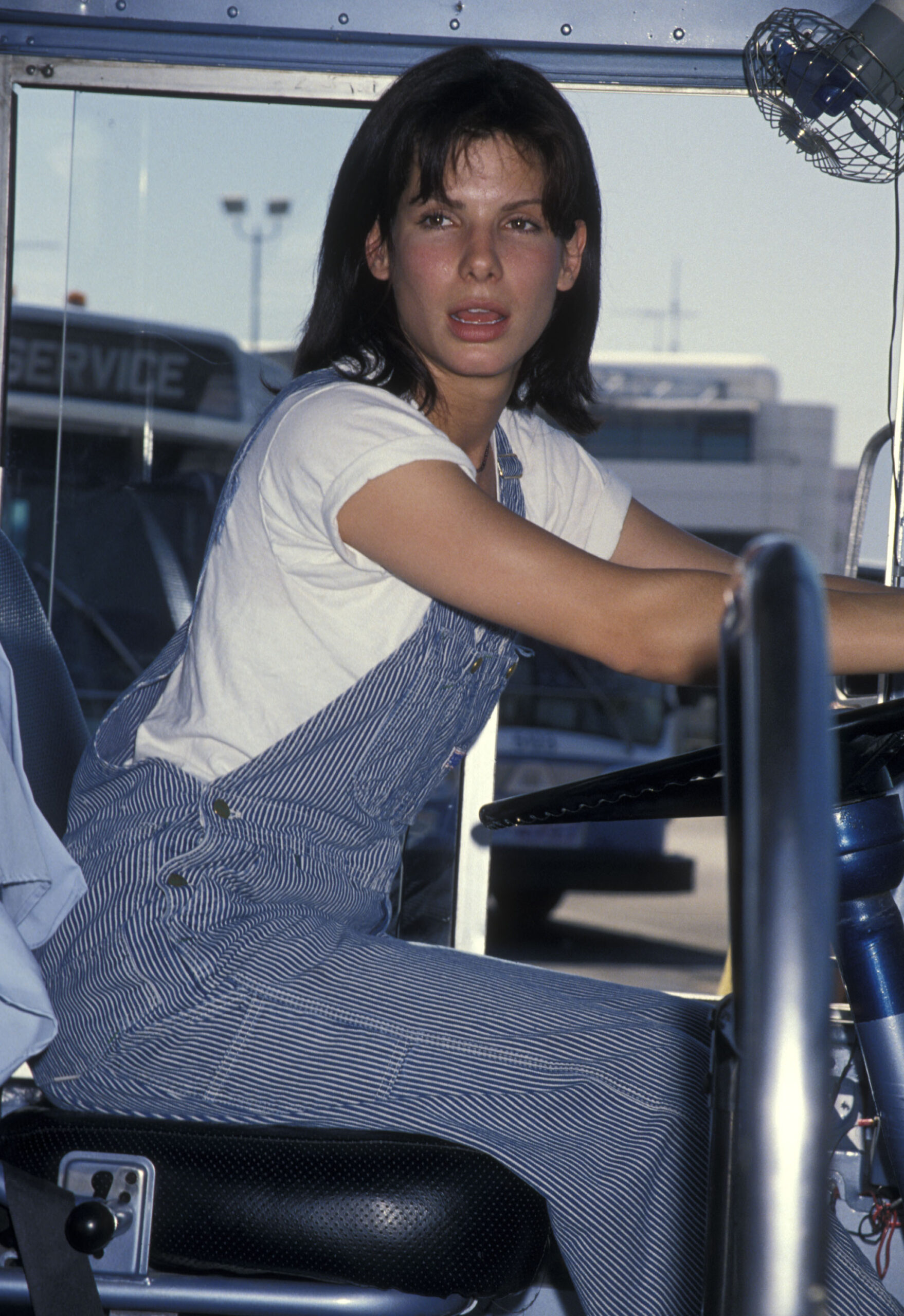 Actress Sandra Bullock takes a bus driver's test to promote her new movie 'Speed' on June 1, 1994 at the Santa Monica Bus ...