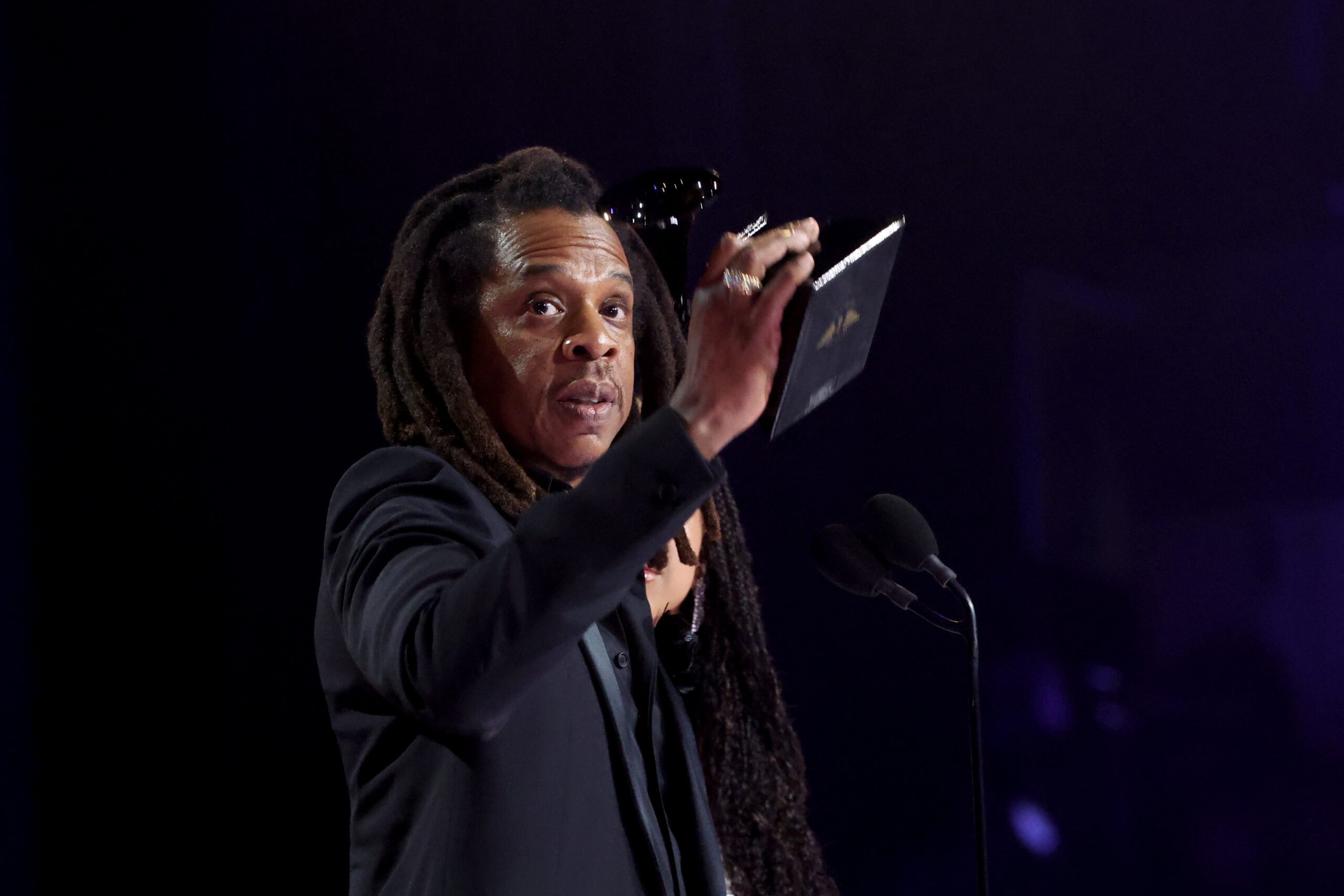 LOS ANGELES, CALIFORNIA - FEBRUARY 04: (LR) Honoree Jay-Z accepts the Dr. Dre Global Impact Award onstage during the 66th ...