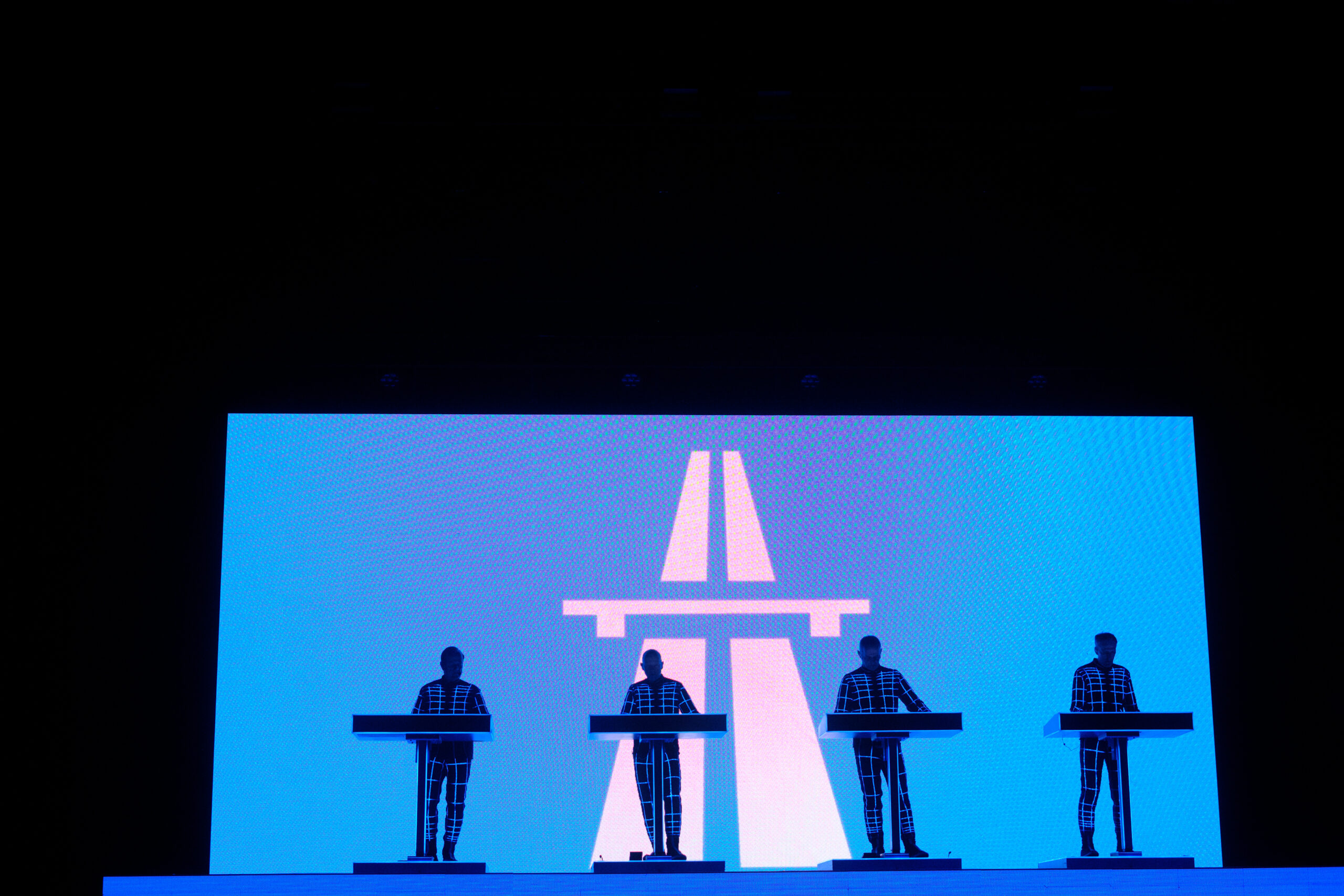 ATLANTA, GEORGIA - MARCH 23: Ralf Hütter, Henning Schmitz, Falk Grieffenhagen, and Georg Bongartz of Kraftwerk perform at...
