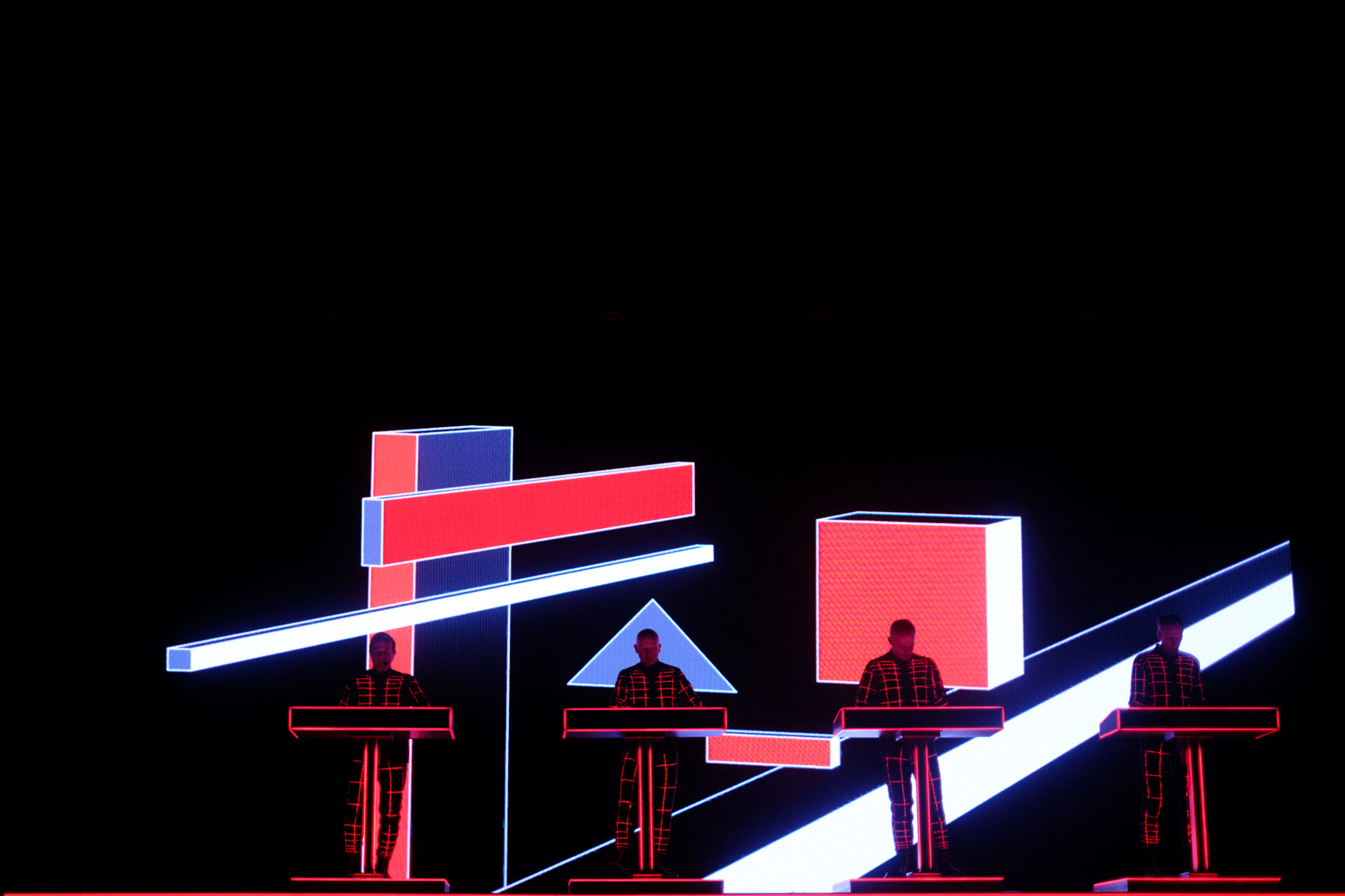 ATLANTA, GEORGIA - MARCH 23: Ralf Hütter, Henning Schmitz, Falk Grieffenhagen, and Georg Bongartz of Kraftwerk perform at...