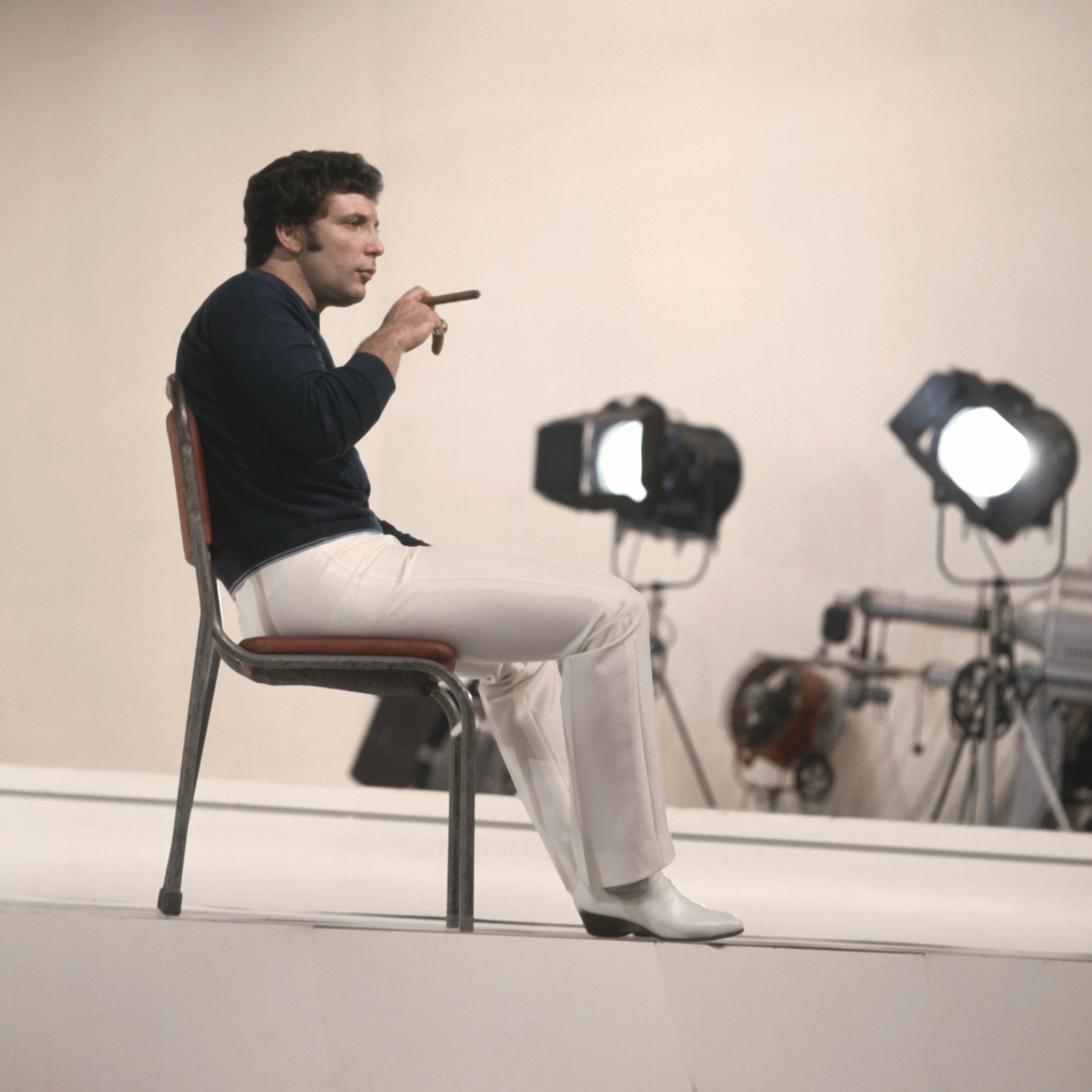 Tom Jones smoking cigar on the set of his 1969-71 US TV series 'This is Tom Jones'. (Photo by Screen Archives/Getty Images)
