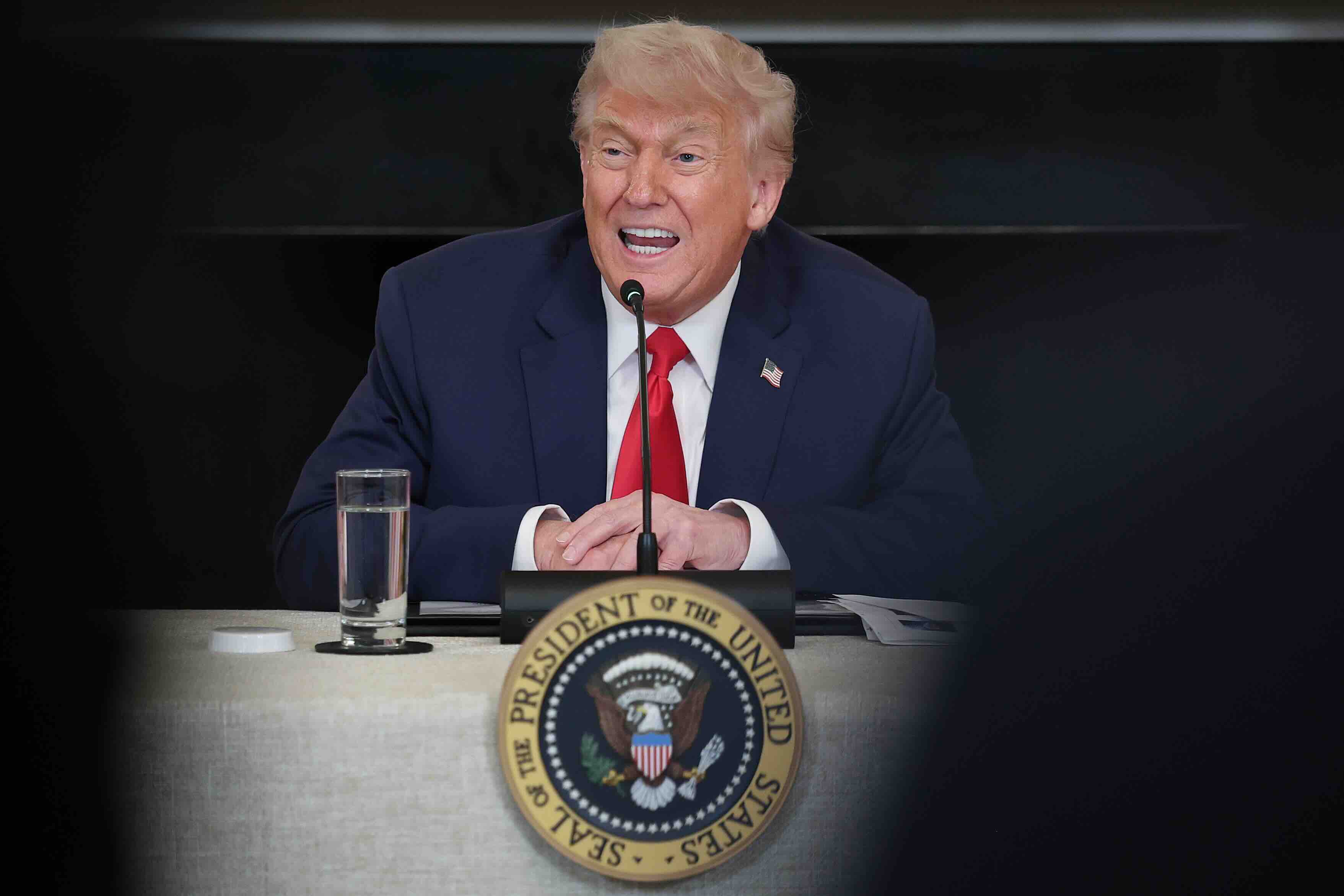 WASHINGTON, DC - JUNE 09: U.S. President Donald Trump answers questions from members of the press during the Invest Americ...