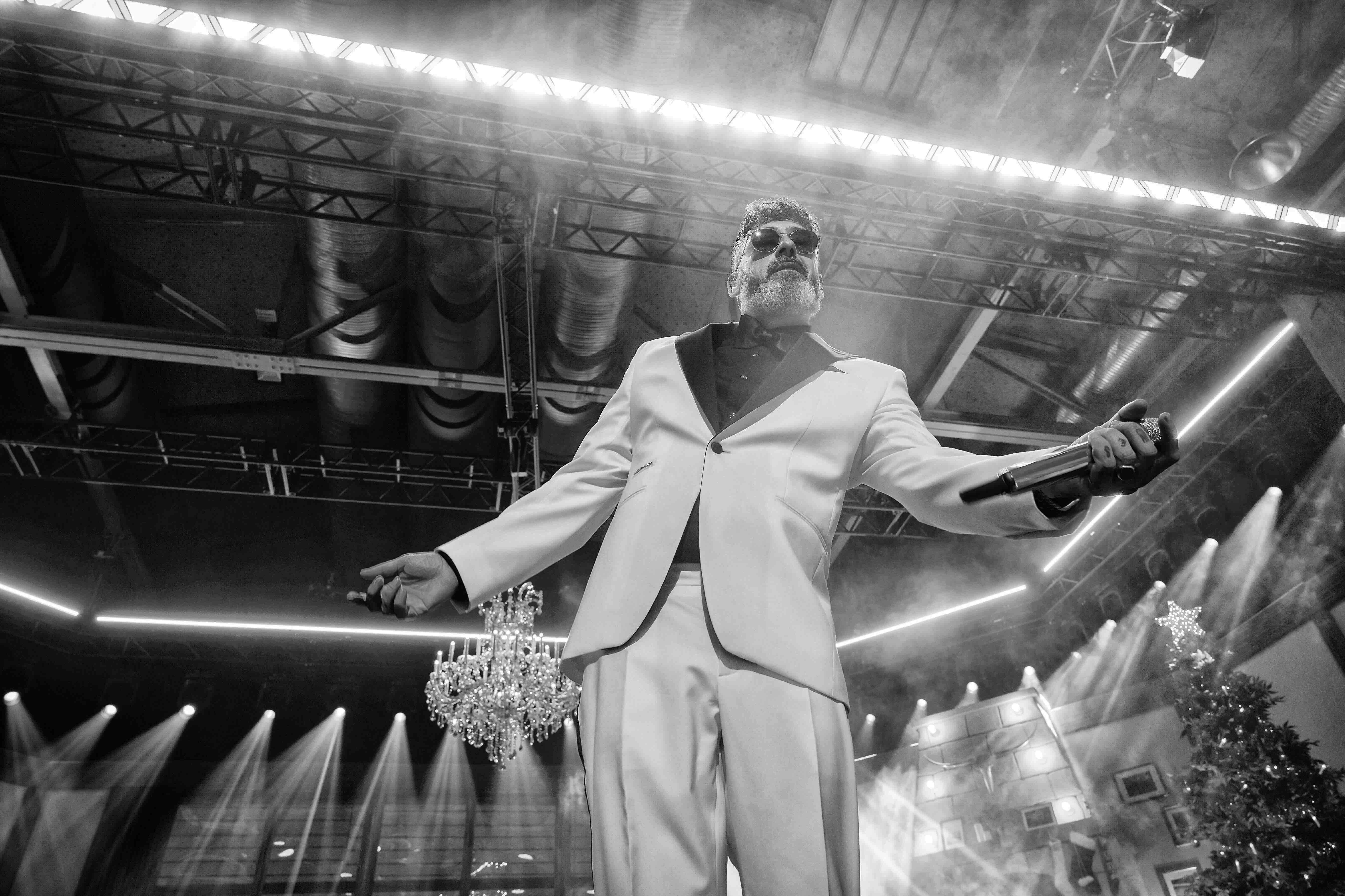 BERLIN, GERMANY - DECEMBER 11: (EDITORS NOTE: Image has been converted to black and white.) German rapper Sido performs li...