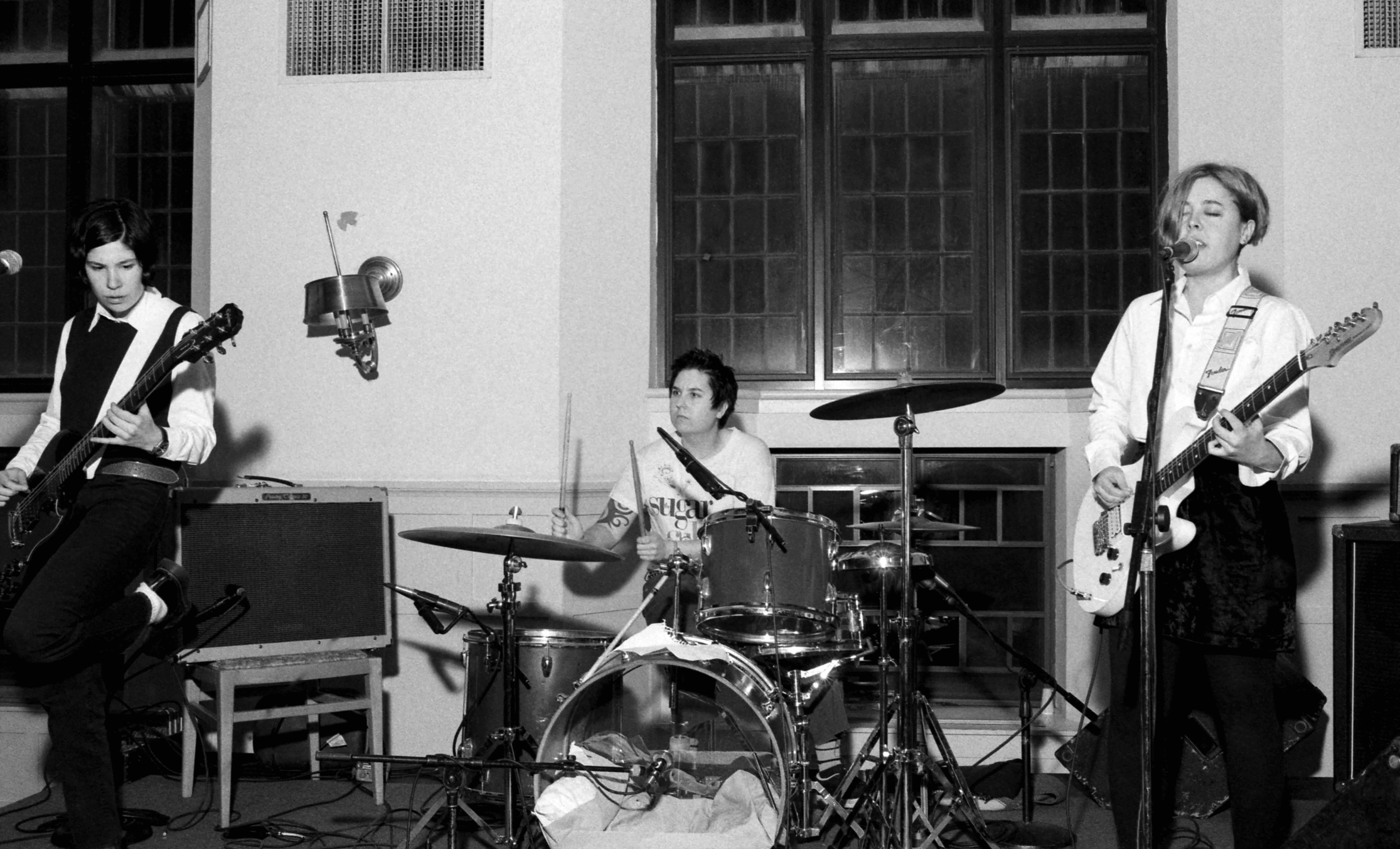 BRYN MAWR, PA - MARCH, 1996: (L-R) American musician, actress, writer, director, and comedian Carrie Brownstein, drummer T...