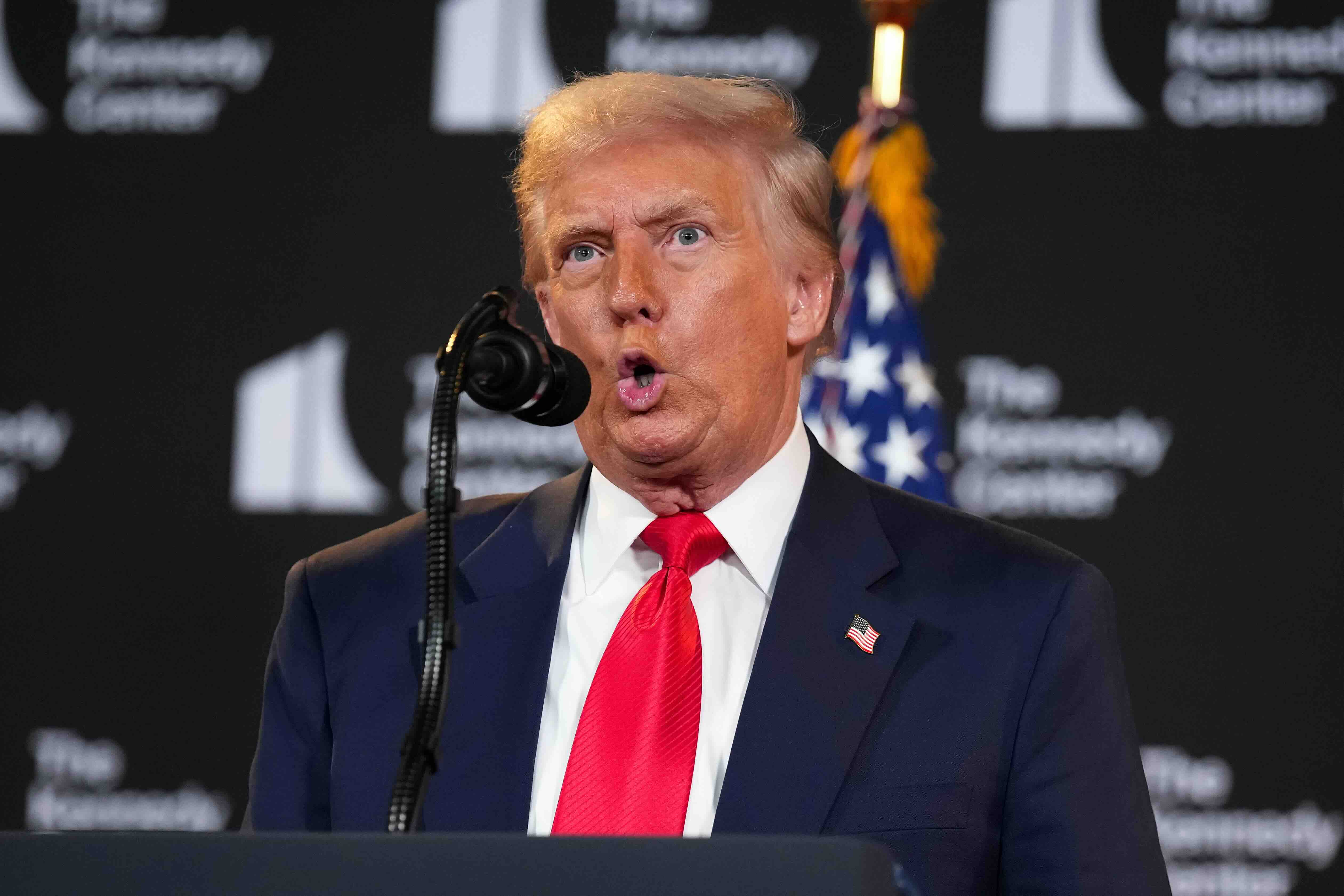 WASHINGTON, DC - AUGUST 13: U.S. President Donald Trump mocks Federal Reserve Chair Jerome Powell as he speaks during an e...