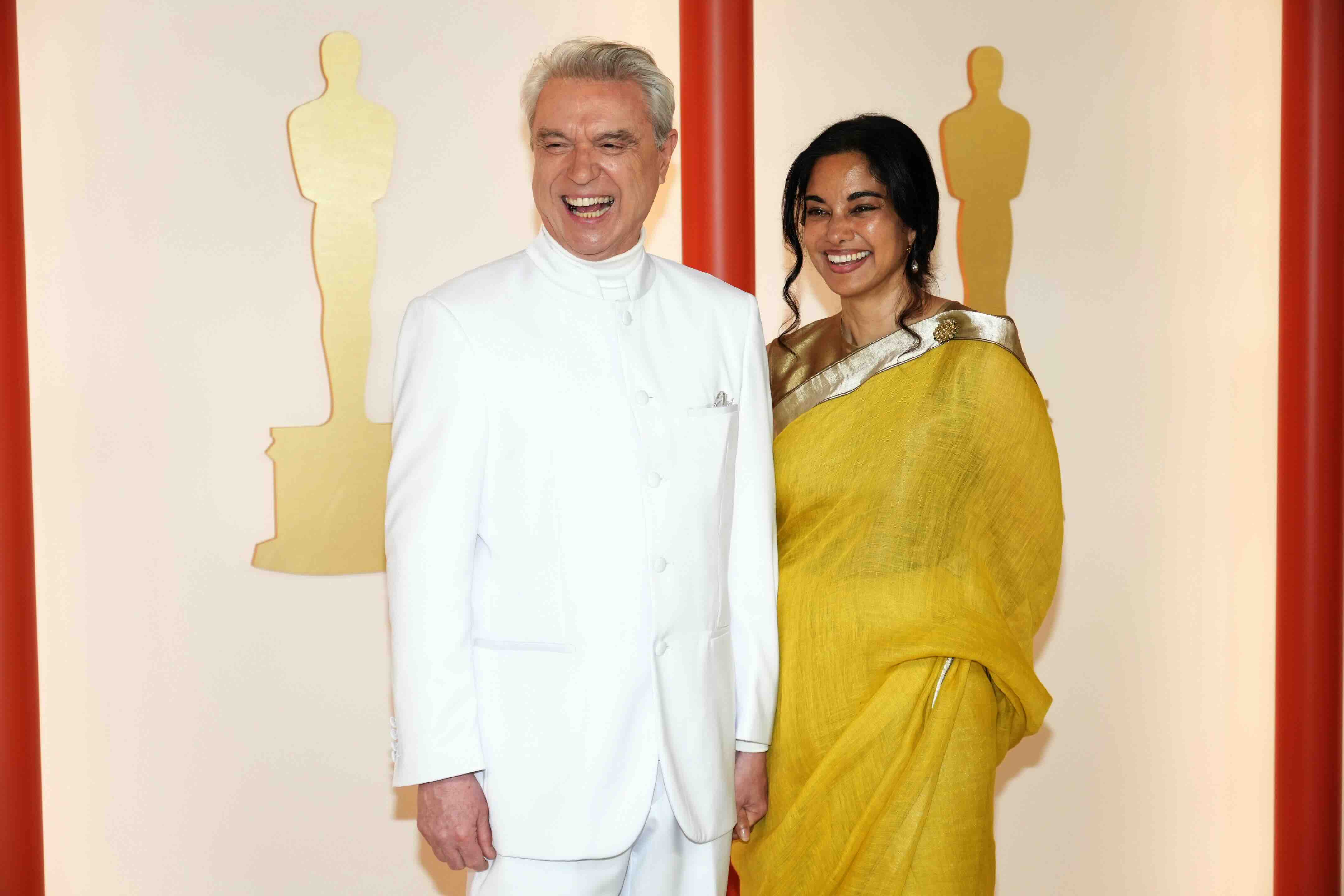 HOLLYWOOD, CALIFORNIA - MARCH 12: (L-R) David Byrne and Mala Gaonkar attend the 95th Annual Academy Awards on March 12, 20...