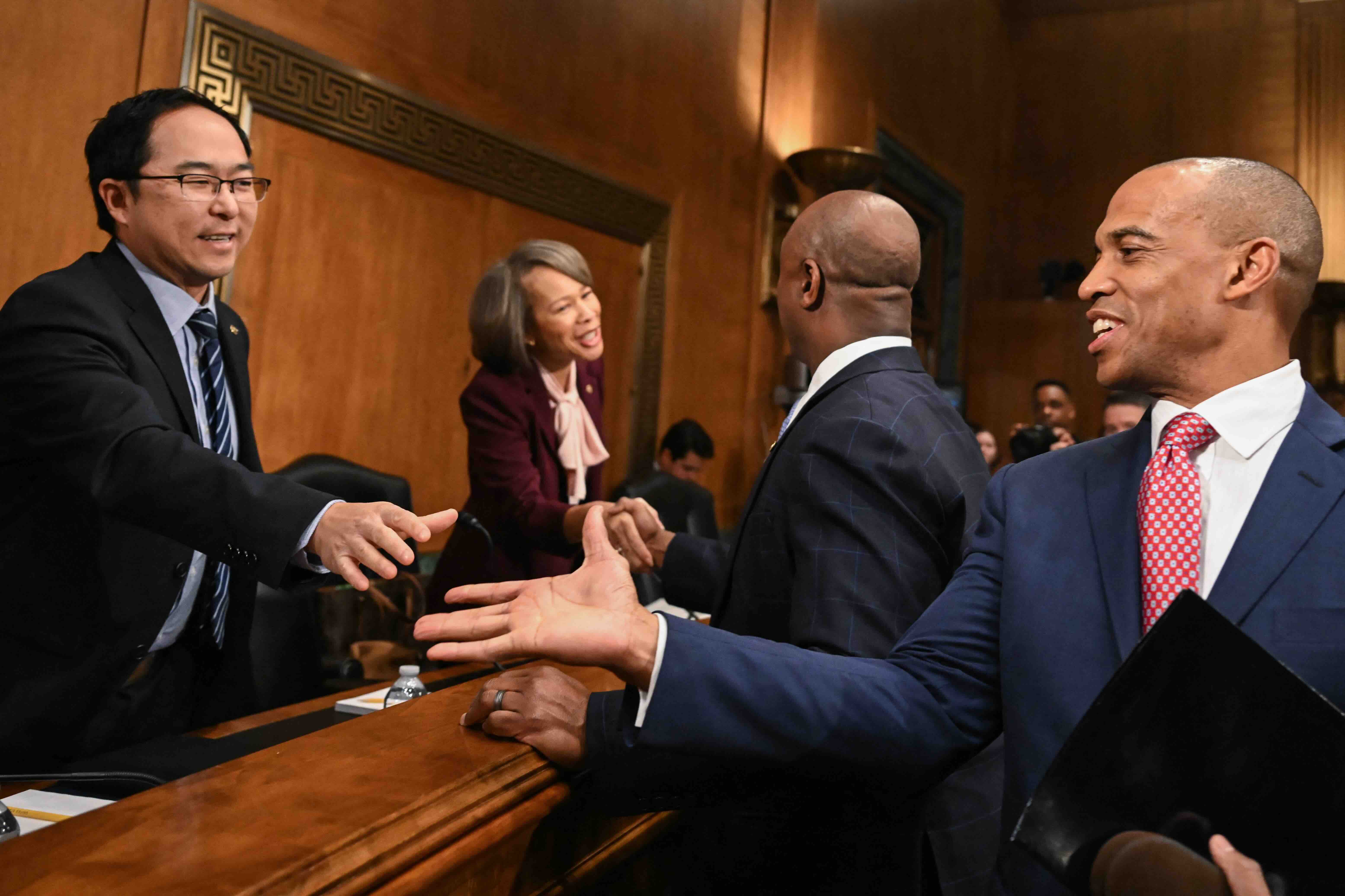 Eric Turner (R), former White House Director of the Opportunity and Revitalization Council, shakes hands with US Senator A...